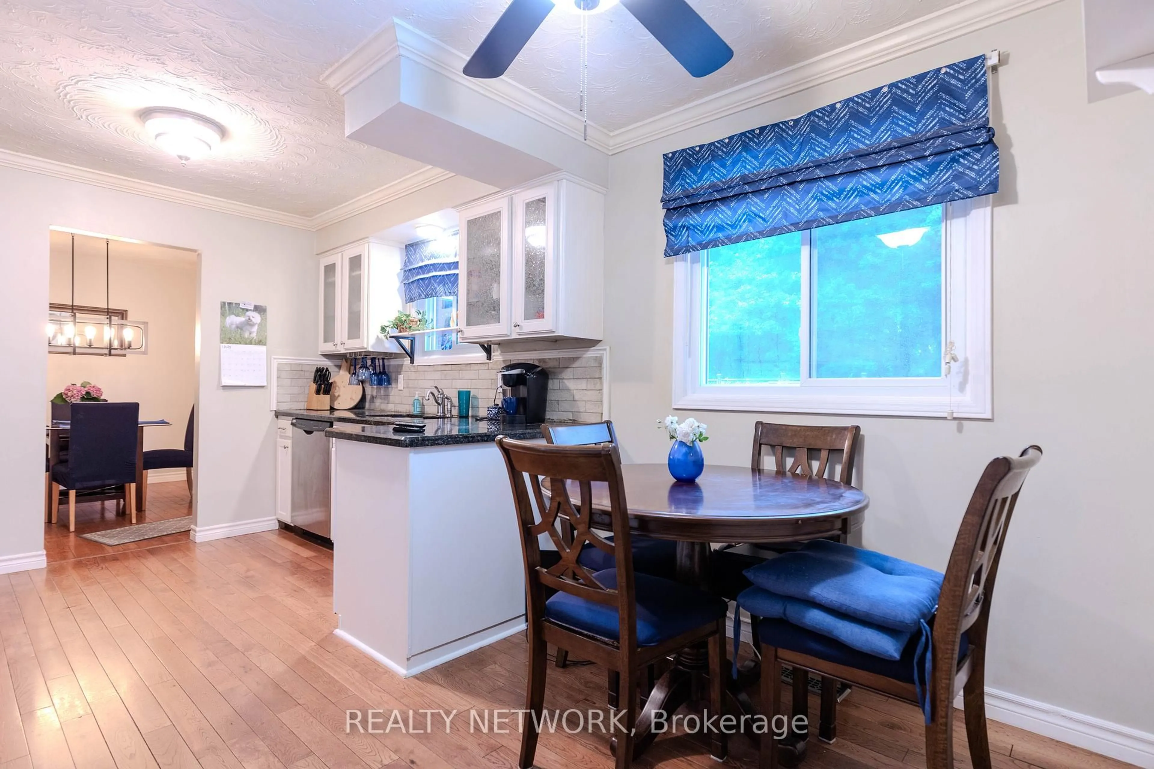 Open concept kitchen, wood/laminate floor for 6539 Jupiter Blvd, Niagara Falls Ontario L2J 3Y4