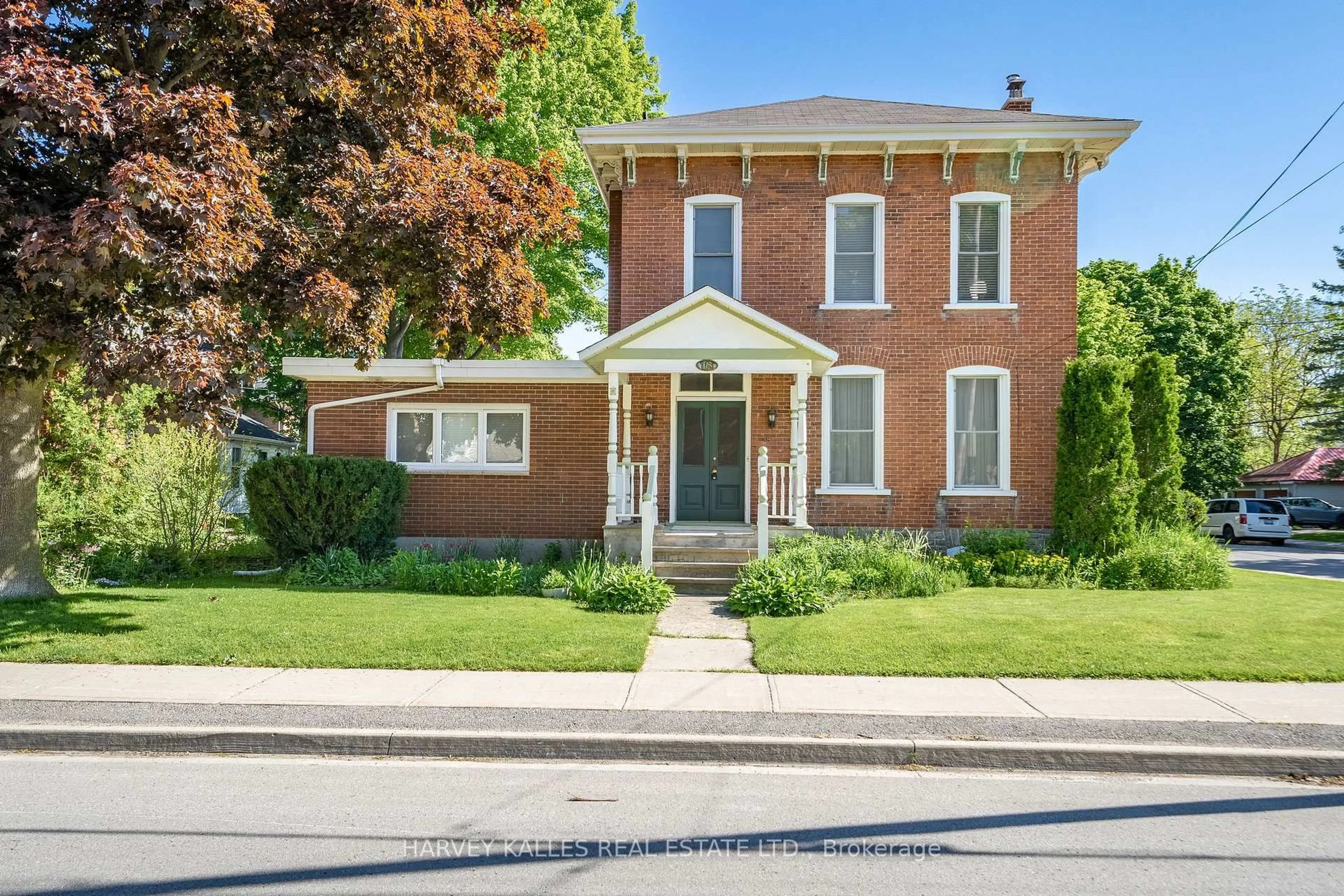 Home with brick exterior material, street for 18 Centre St, Prince Edward County Ontario K0K 2T0