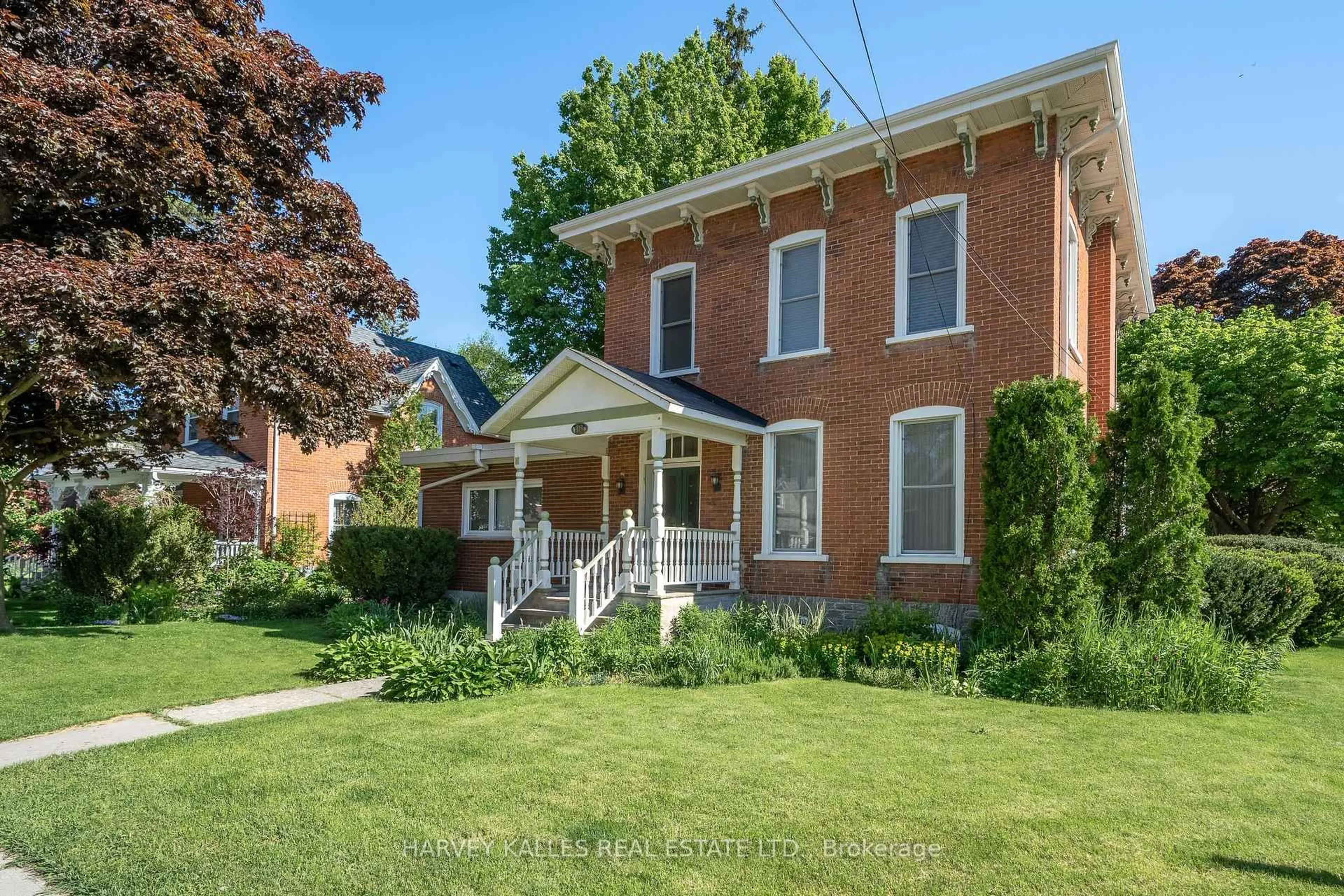 Home with brick exterior material, street for 18 Centre St, Prince Edward County Ontario K0K 2T0