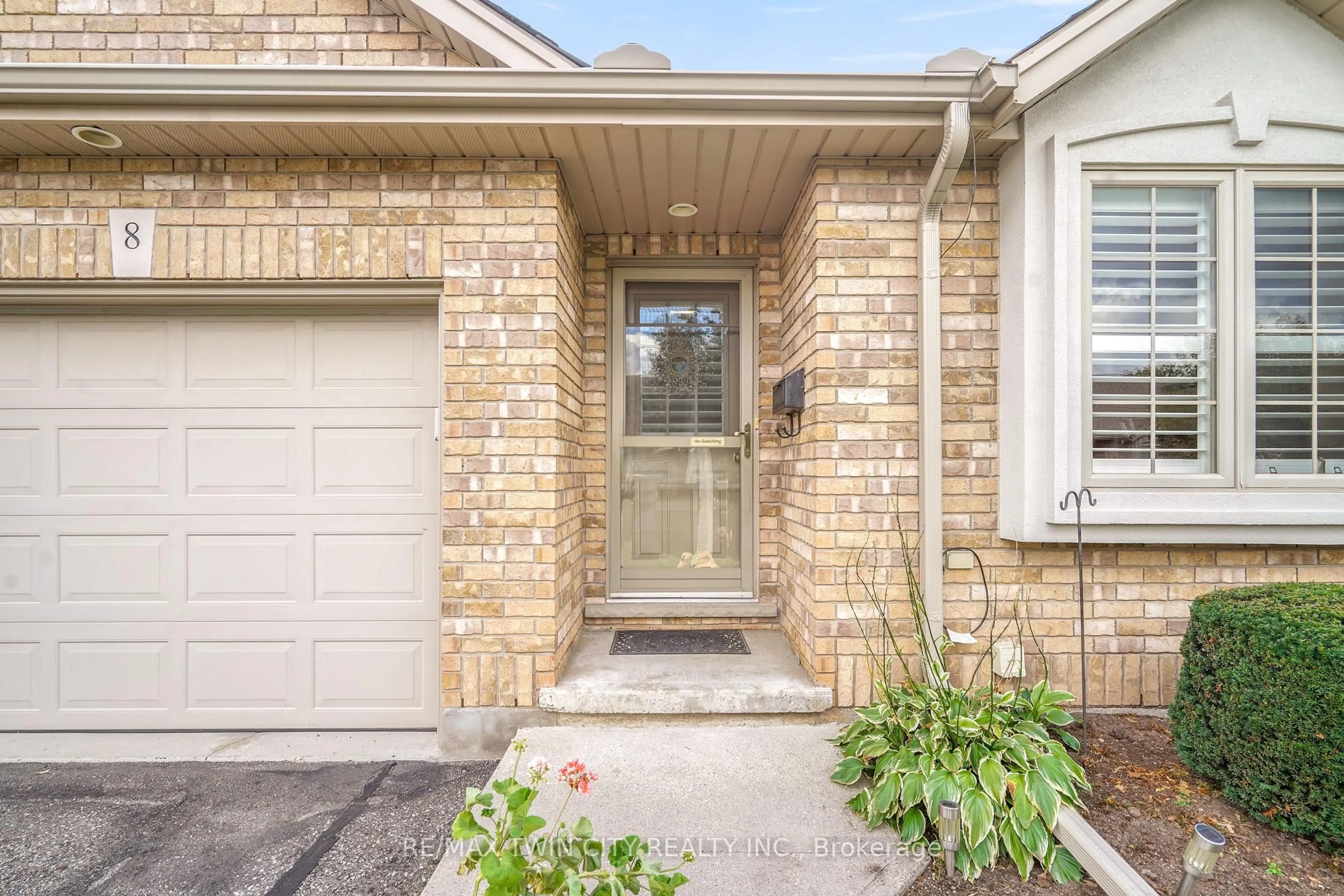 Home with brick exterior material, street for 25 Cobden Crt #8, Brantford Ontario N3R 8B5