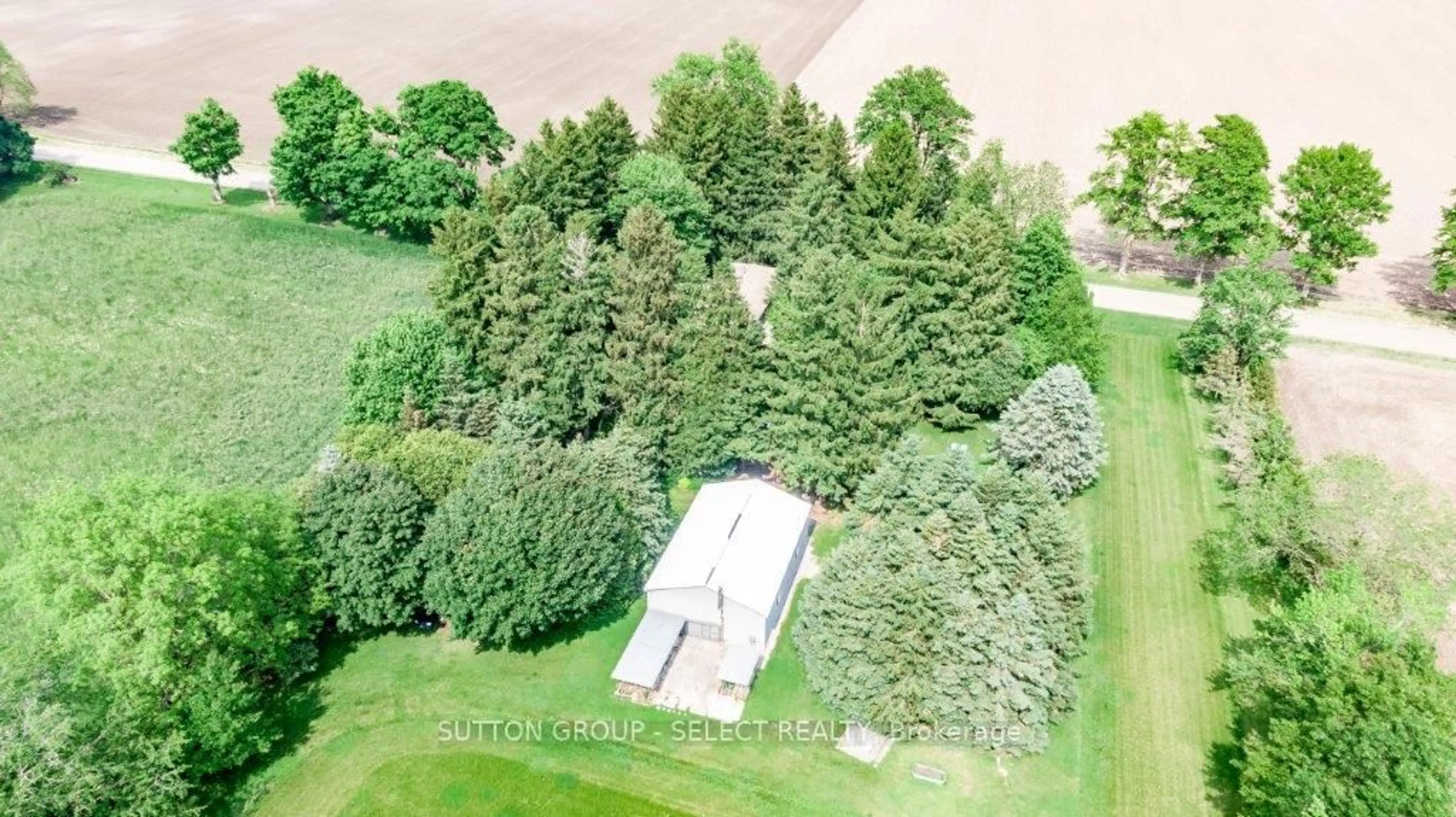 A pic from outside/outdoor area/front of a property/back of a property/a pic from drone, forest/trees view for 23471 Heritage Rd, Thames Centre Ontario N0M 2P0
