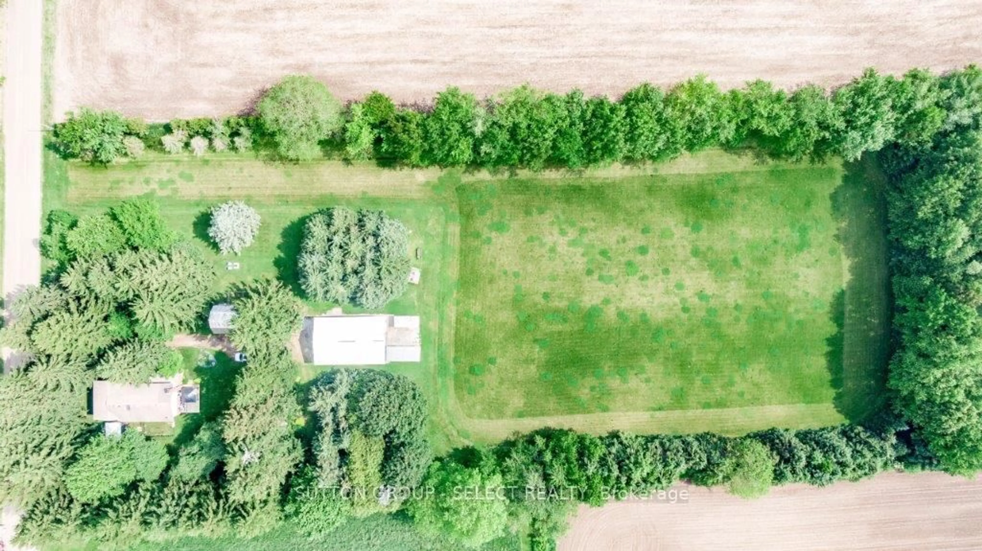 A pic from outside/outdoor area/front of a property/back of a property/a pic from drone, forest/trees view for 23471 Heritage Rd, Thames Centre Ontario N0M 2P0