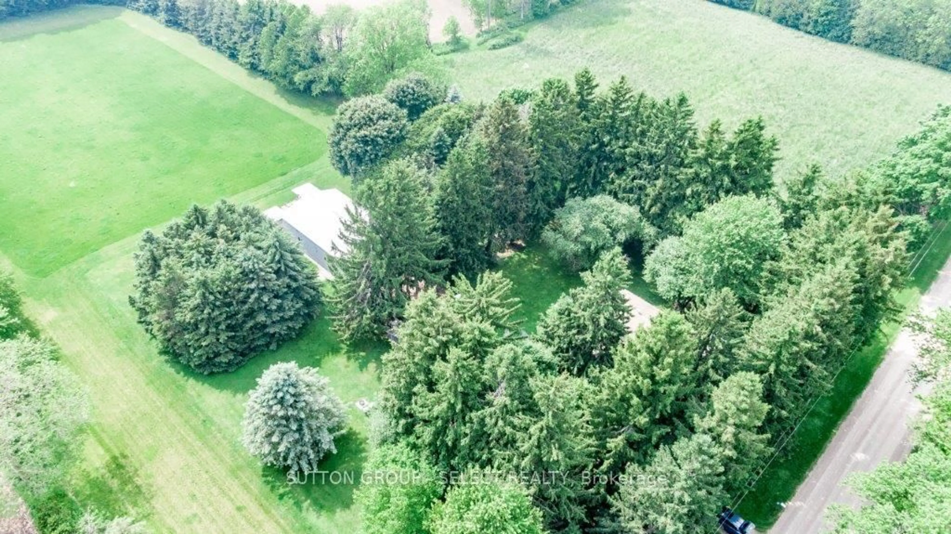 A pic from outside/outdoor area/front of a property/back of a property/a pic from drone, forest/trees view for 23471 Heritage Rd, Thames Centre Ontario N0M 2P0