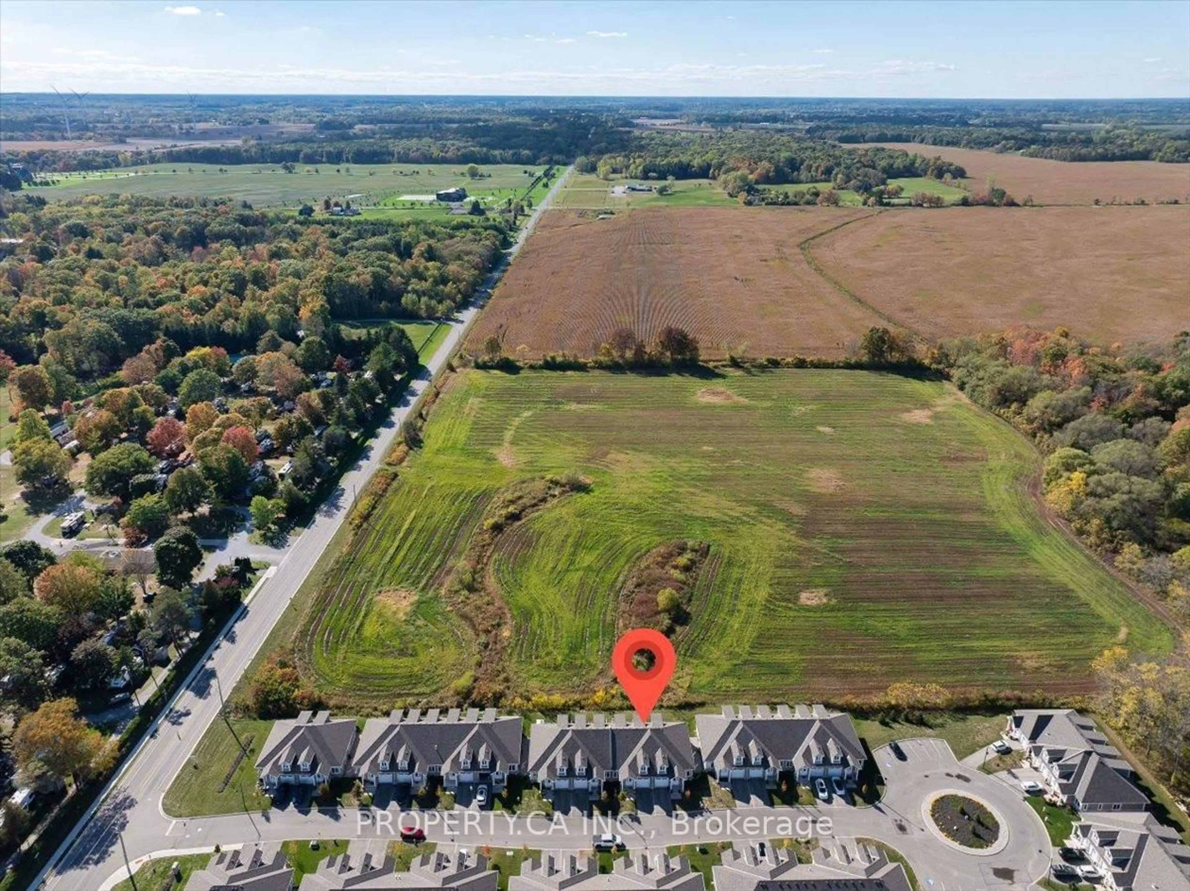 A pic from outside/outdoor area/front of a property/back of a property/a pic from drone, unknown for 744 Nelson St #9, Norfolk Ontario N0A 1N0
