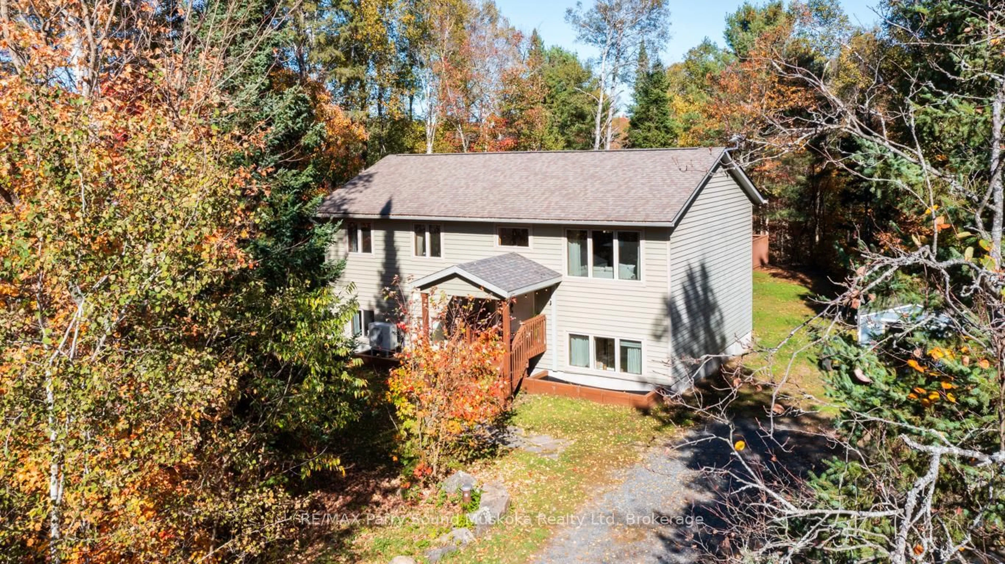 A pic from outside/outdoor area/front of a property/back of a property/a pic from drone, unknown for 312 Centre Rd, McKellar Ontario P2A 0B4
