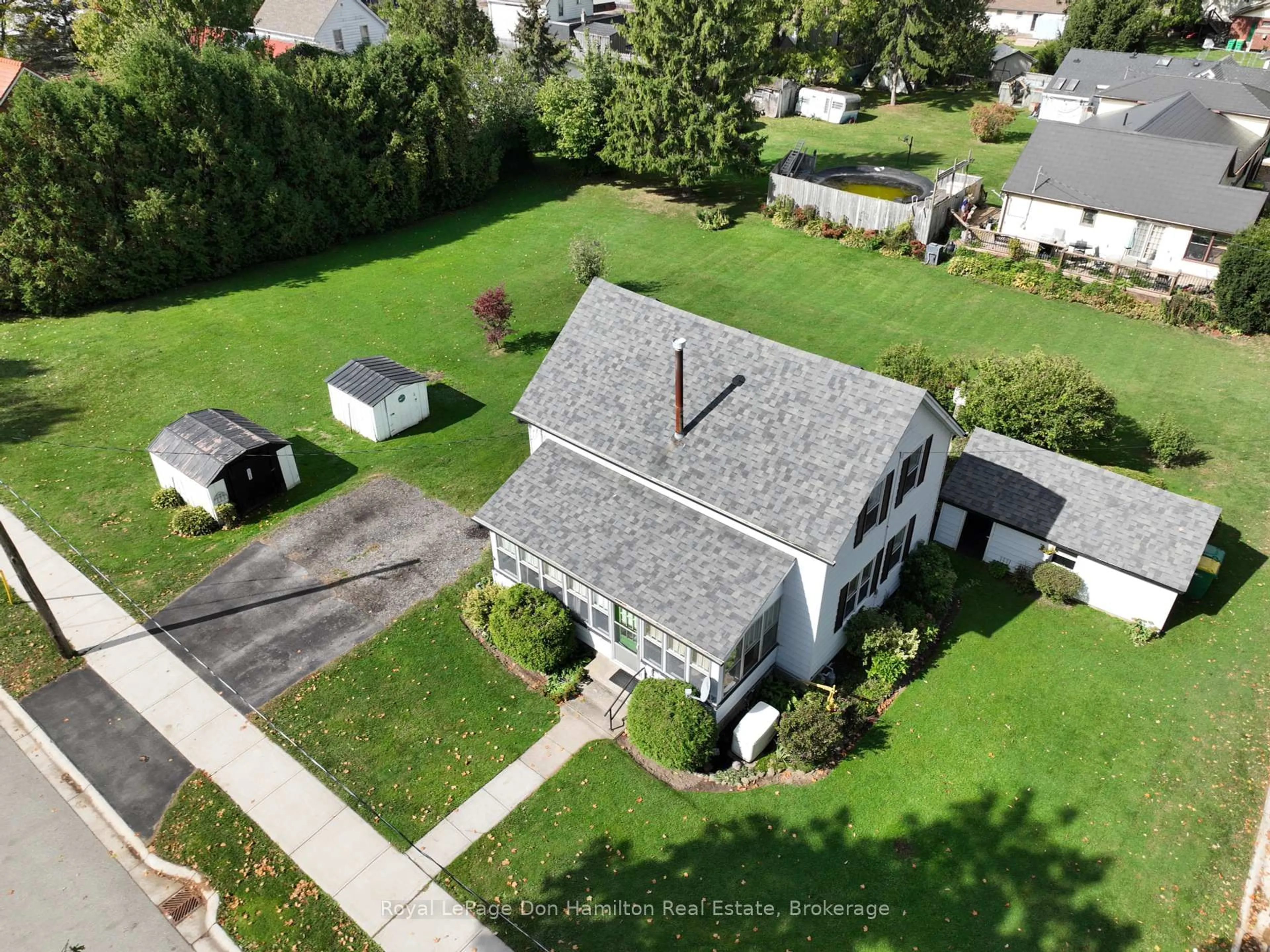 A pic from outside/outdoor area/front of a property/back of a property/a pic from drone, street for 21 Elgin St, Southwest Middlesex Ontario N0L 1A0