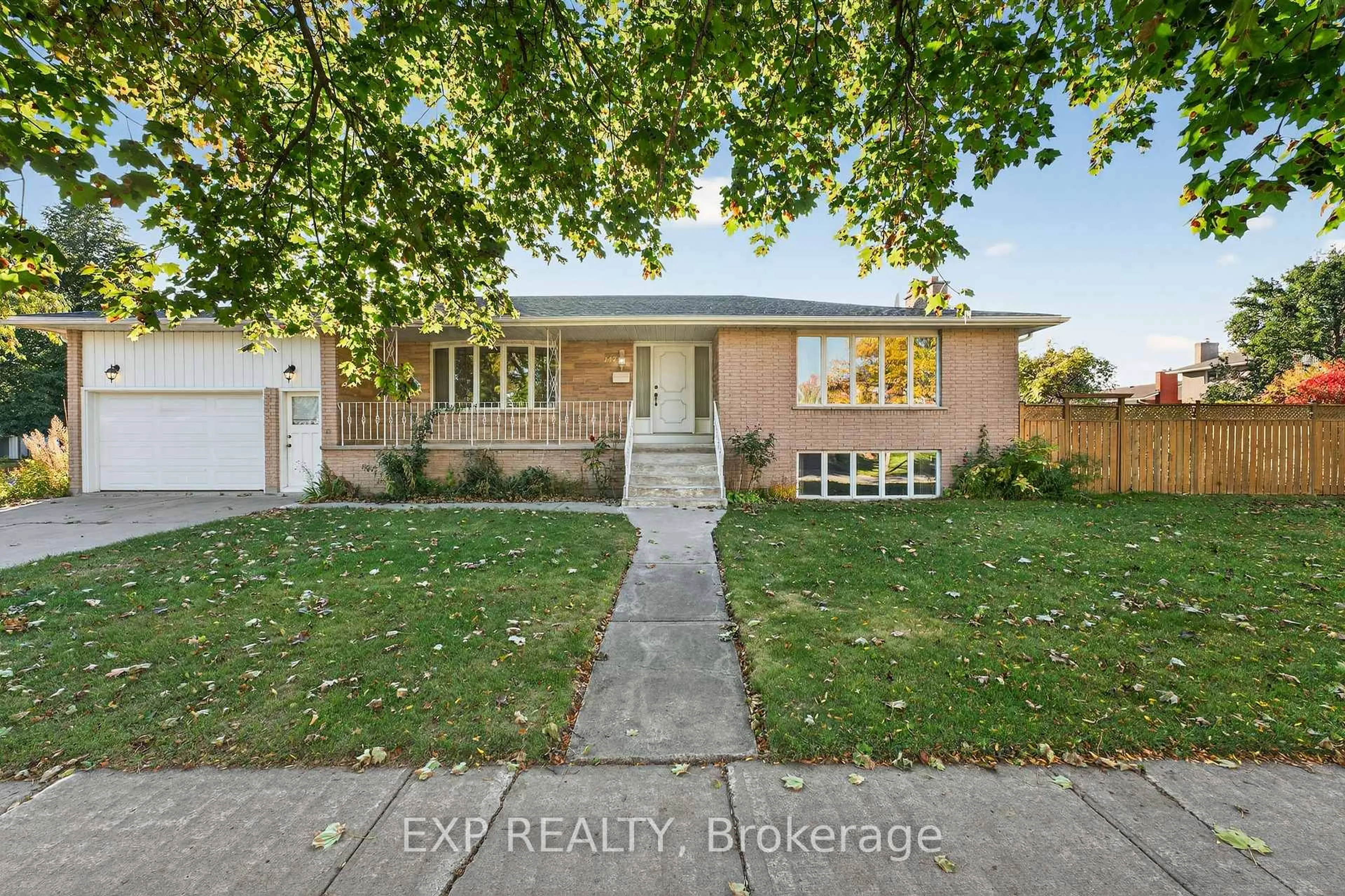 Home with brick exterior material, street for 147 Inverness Cres, Kingston Ontario K7M 6G9