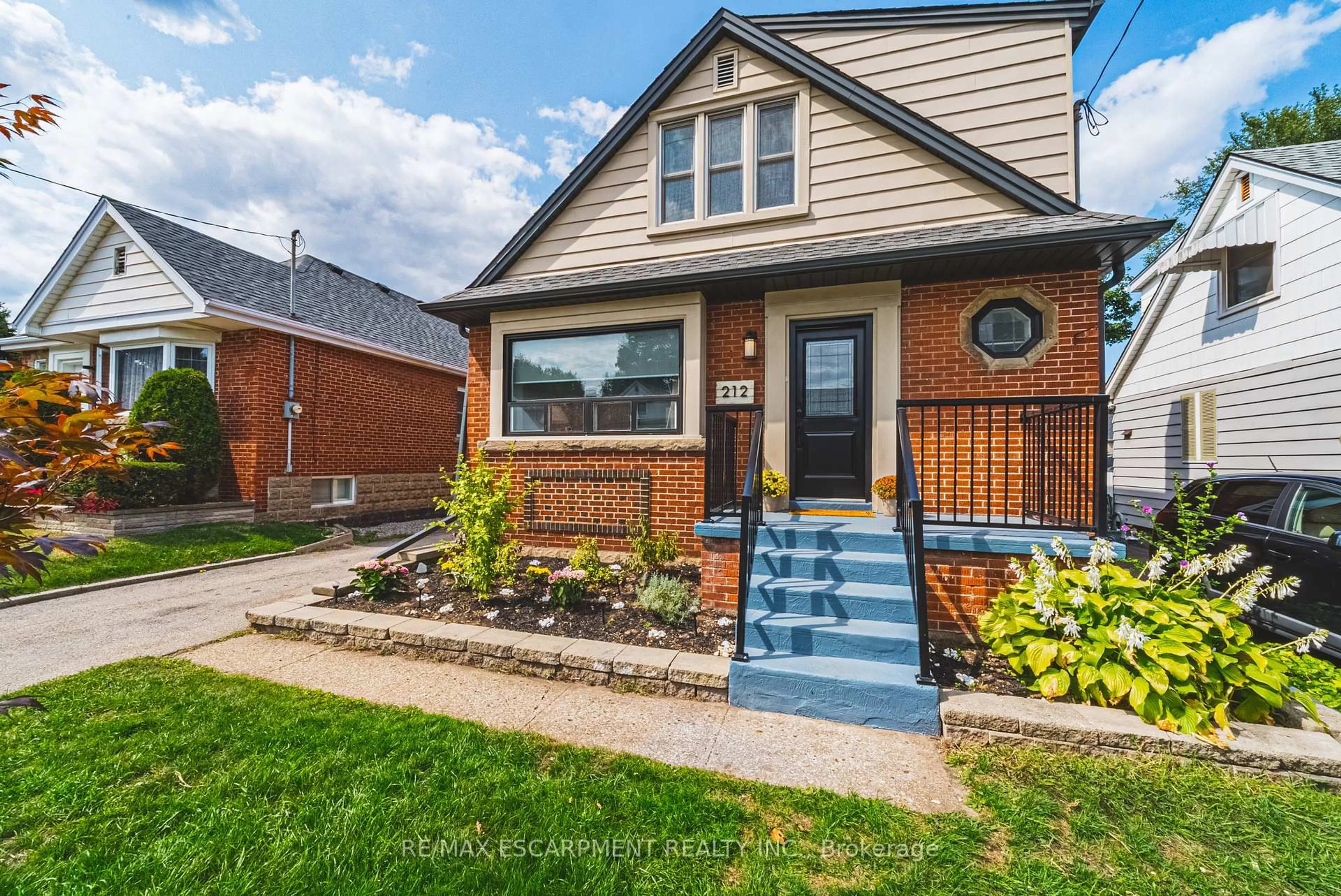 Home with brick exterior material, street for 212 Rodgers Rd, Hamilton Ontario L8K 3C4