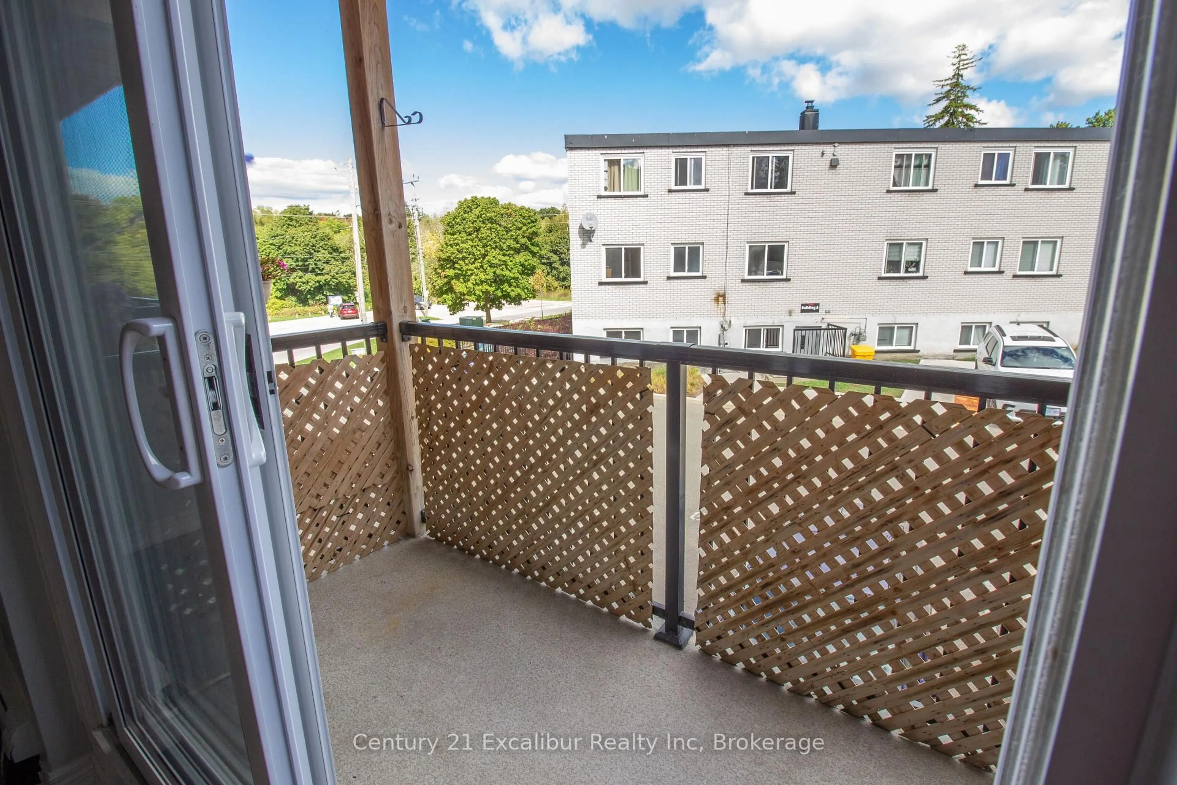Balcony in the apartment, city buildings view from balcony for 320 Queen St #9, Centre Wellington Ontario N1M 1T4