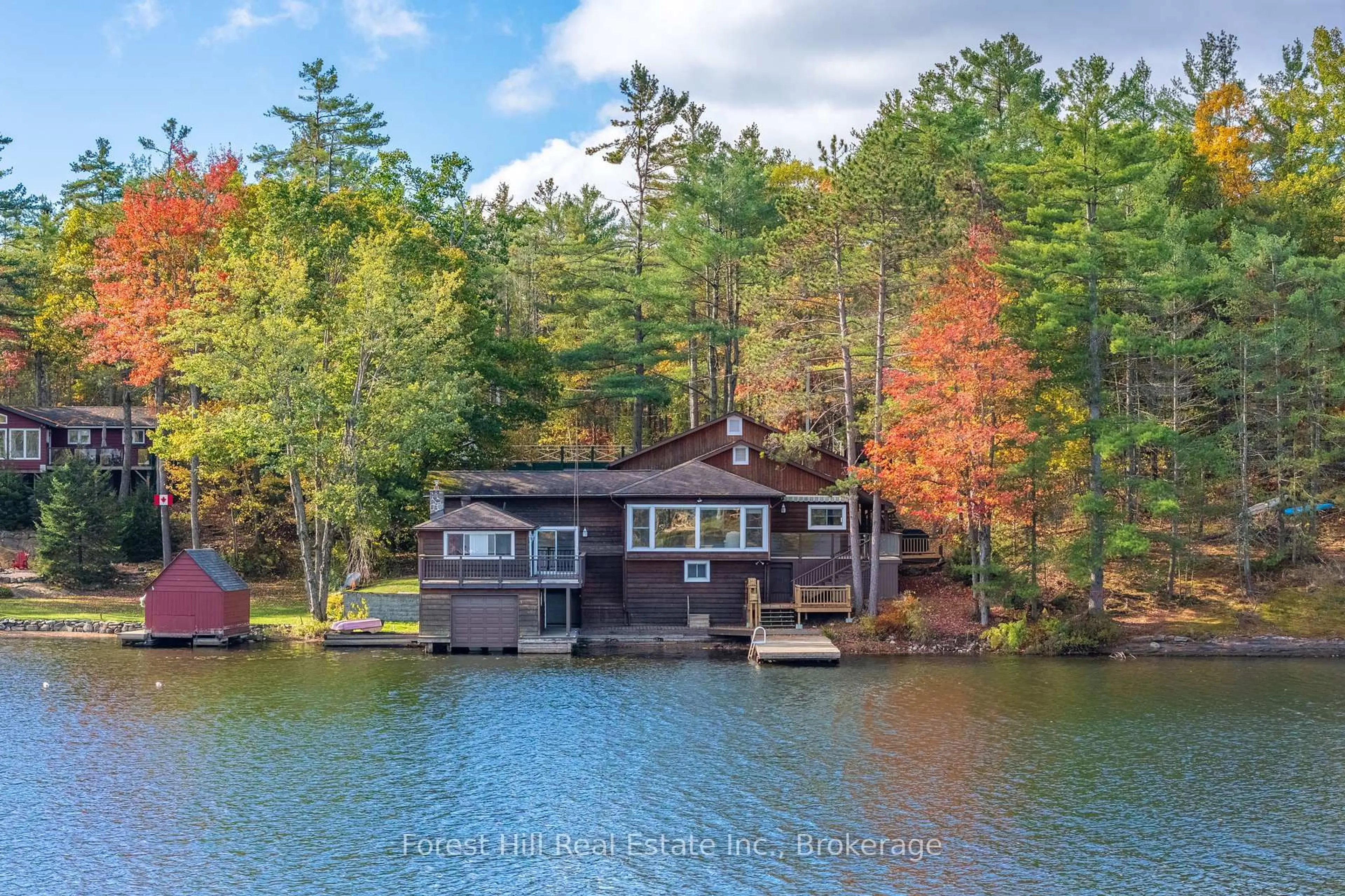 A pic from outside/outdoor area/front of a property/back of a property/a pic from drone, water/lake/river/ocean view for 1062 Pine Lake Rd, Gravenhurst Ontario P1P 1R2