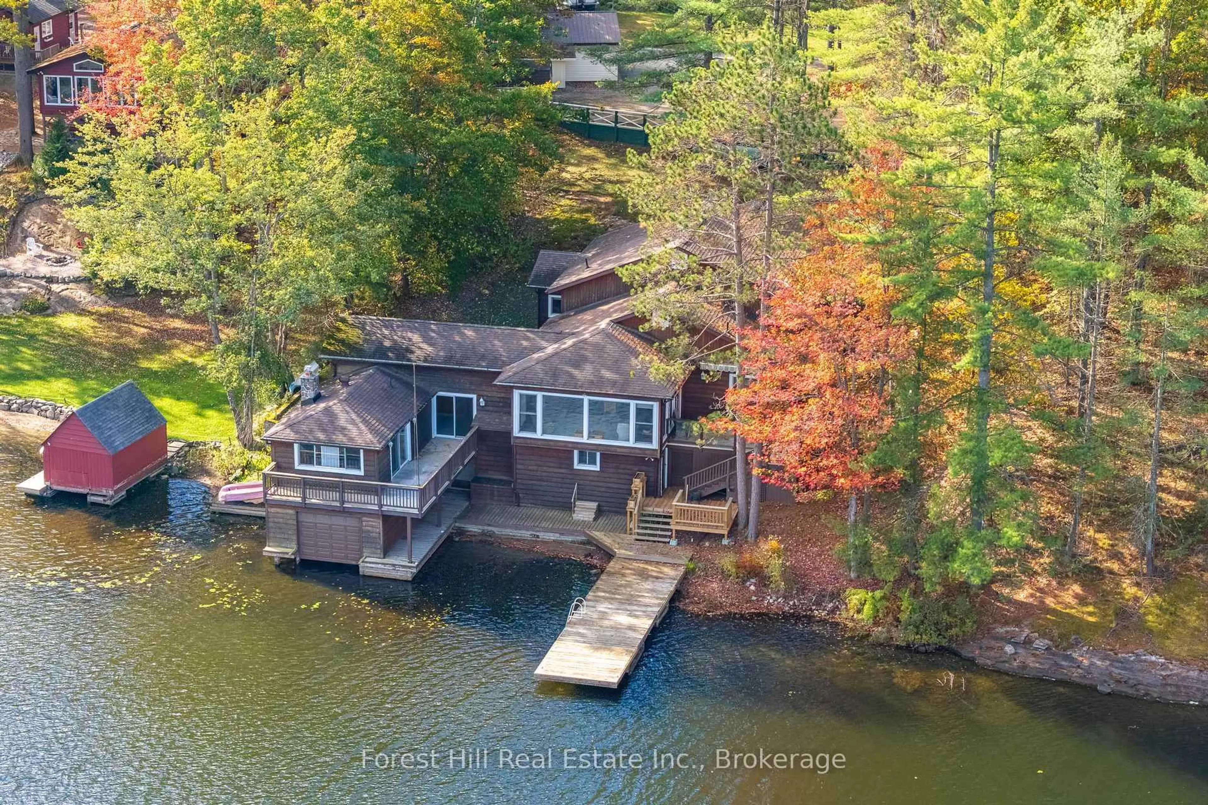 A pic from outside/outdoor area/front of a property/back of a property/a pic from drone, water/lake/river/ocean view for 1062 Pine Lake Rd, Gravenhurst Ontario P1P 1R2