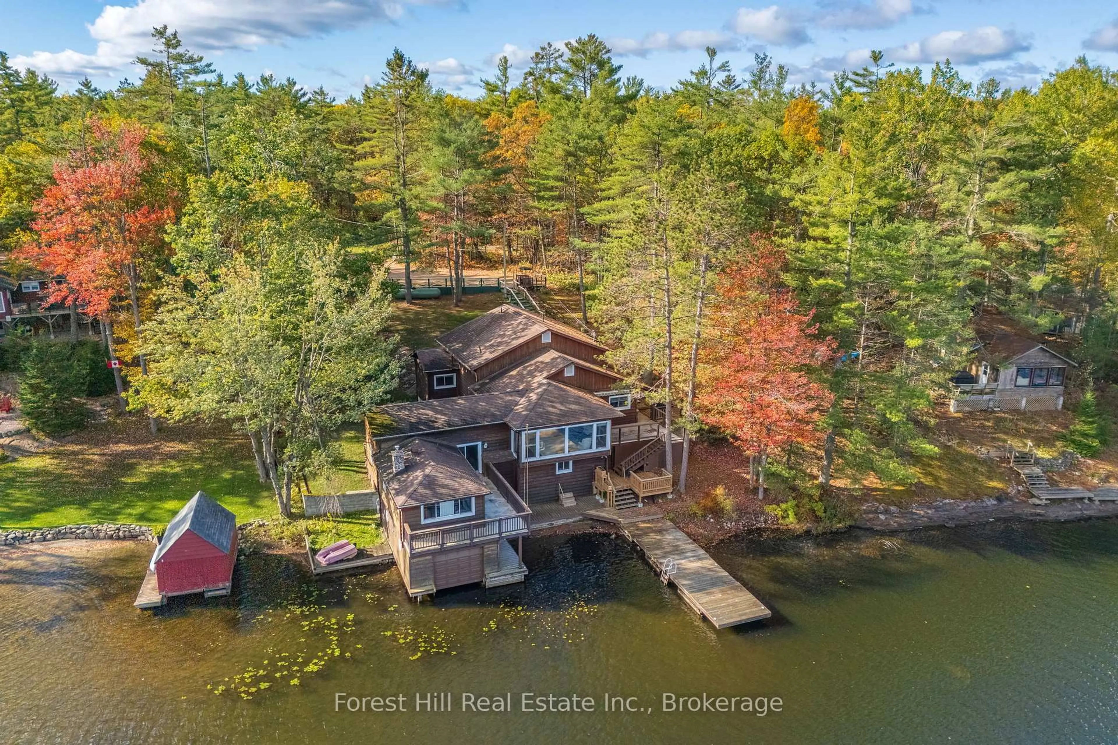 A pic from outside/outdoor area/front of a property/back of a property/a pic from drone, water/lake/river/ocean view for 1062 Pine Lake Rd, Gravenhurst Ontario P1P 1R2