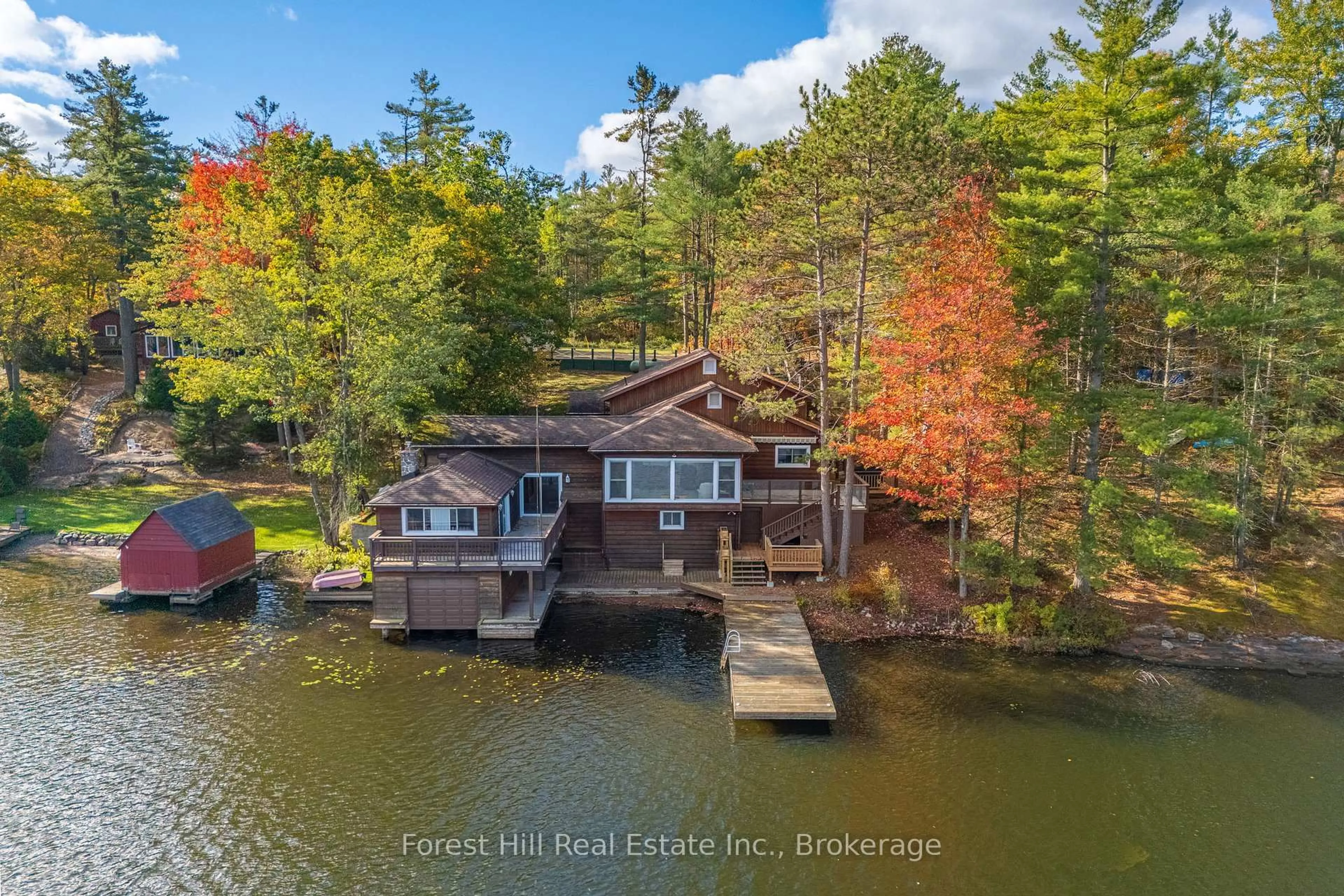 A pic from outside/outdoor area/front of a property/back of a property/a pic from drone, water/lake/river/ocean view for 1062 Pine Lake Rd, Gravenhurst Ontario P1P 1R2