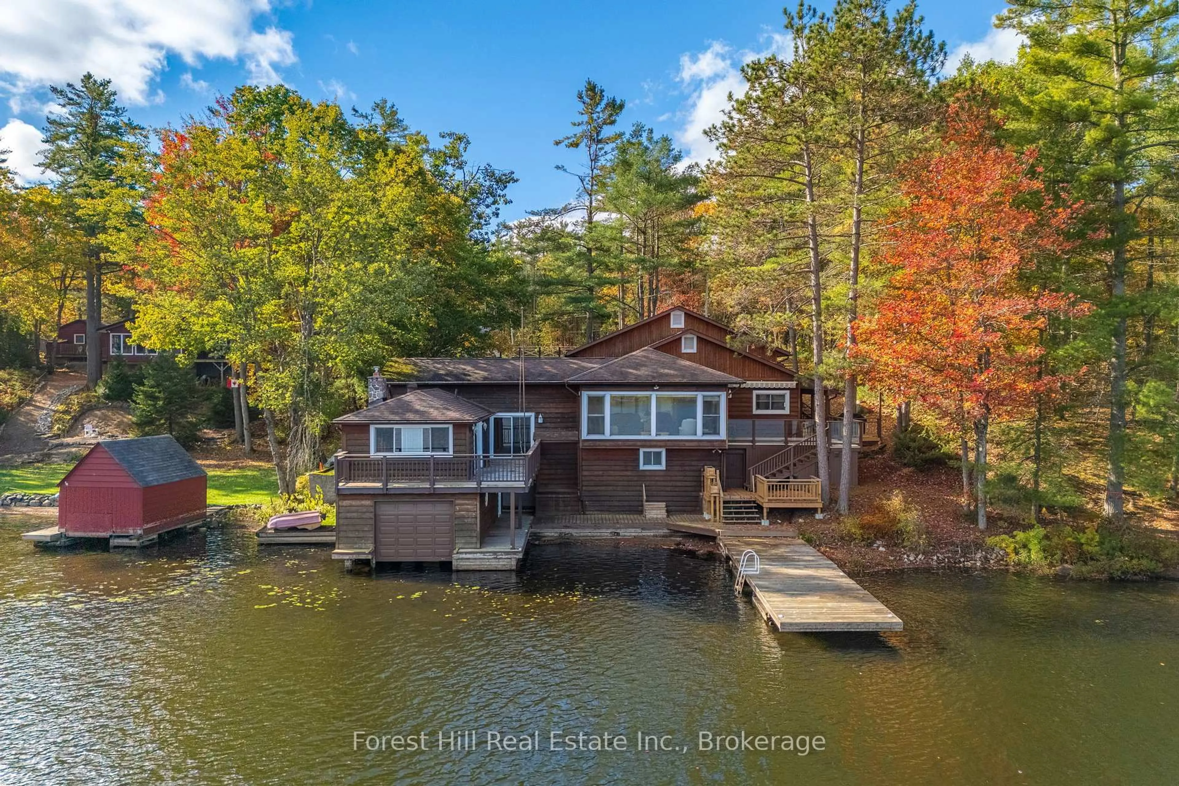 A pic from outside/outdoor area/front of a property/back of a property/a pic from drone, water/lake/river/ocean view for 1062 Pine Lake Rd, Gravenhurst Ontario P1P 1R2