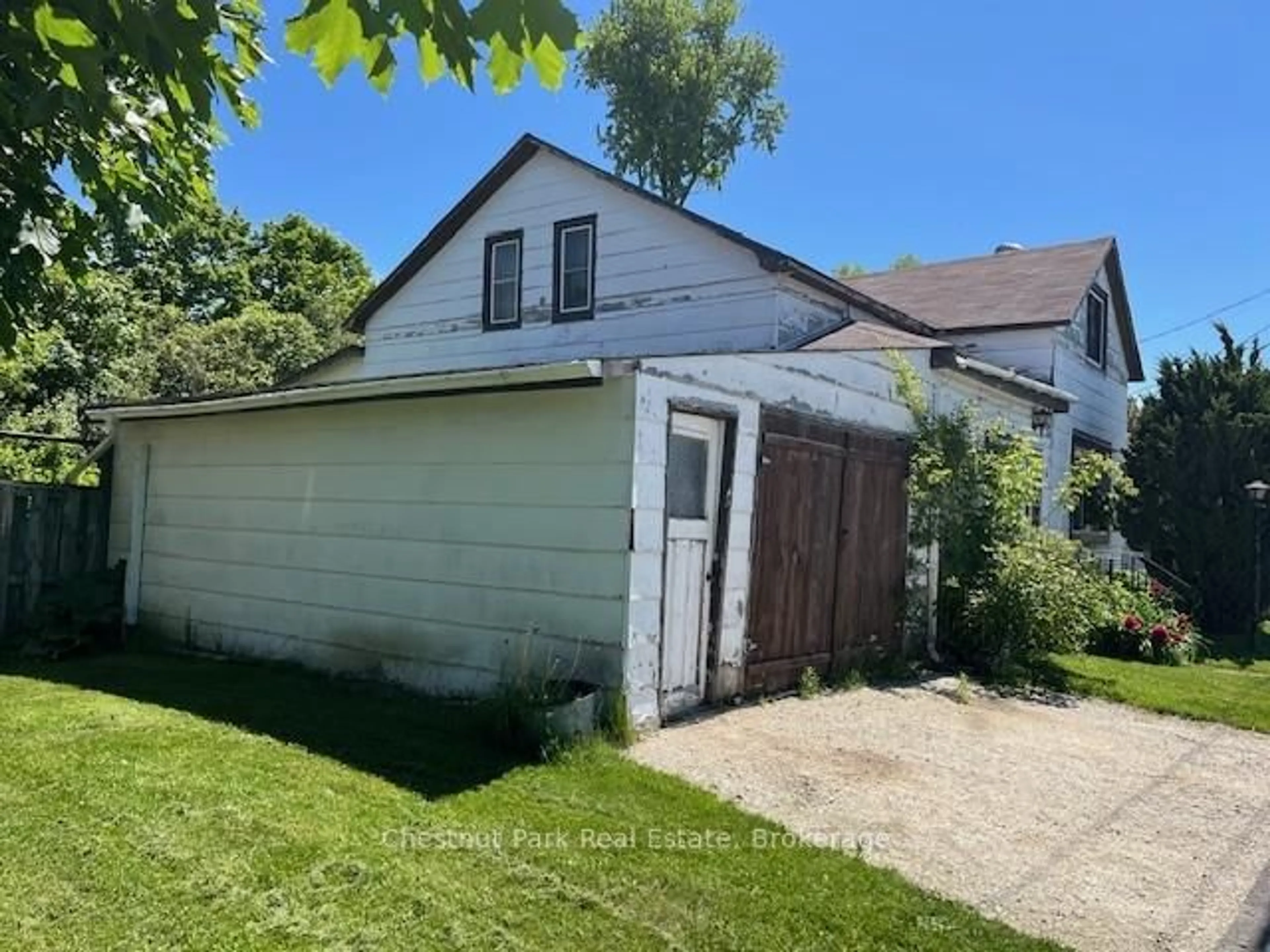 A pic from outside/outdoor area/front of a property/back of a property/a pic from drone, street for 213 Cook St, Meaford Ontario N4L 1H2
