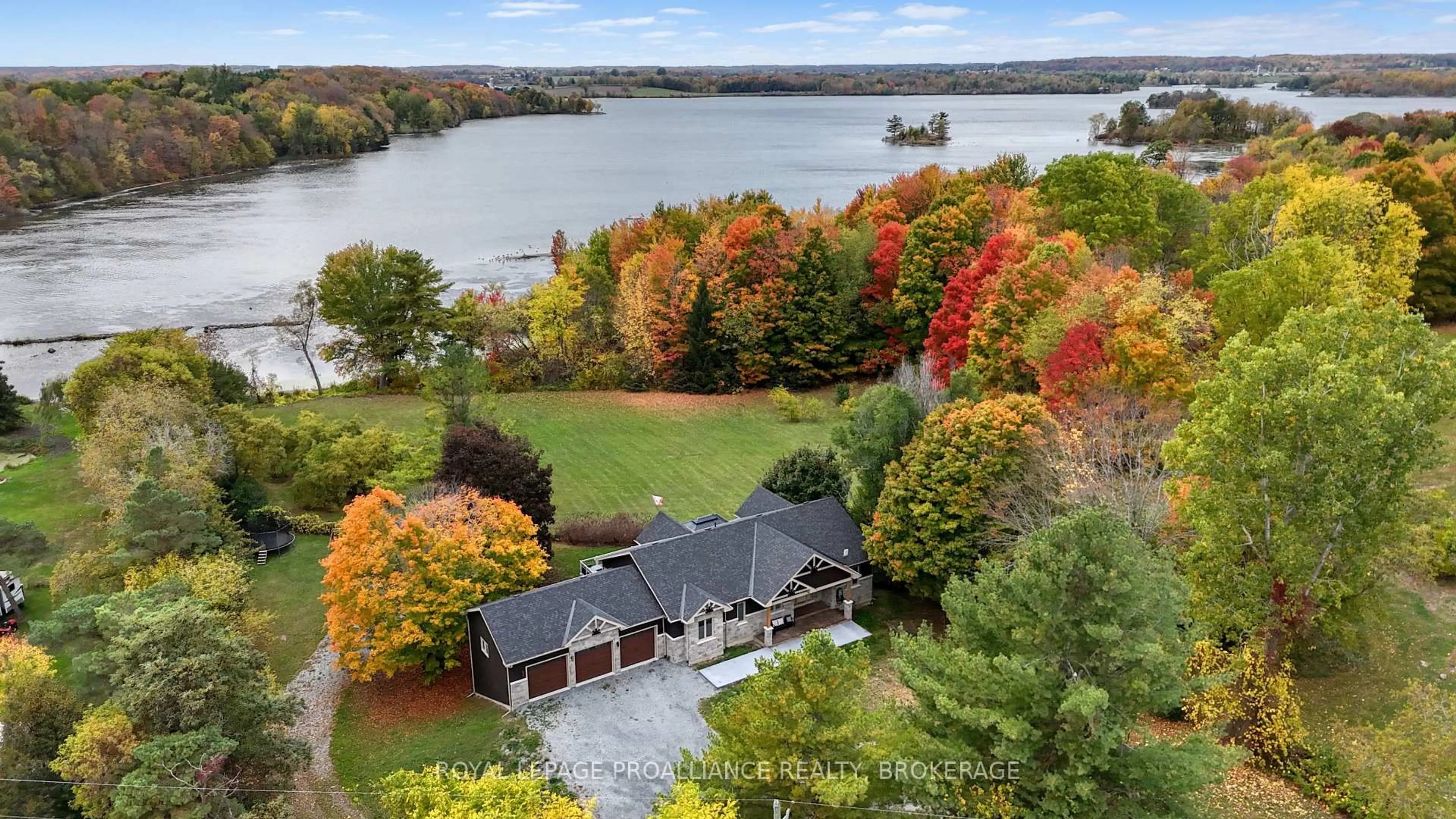 A pic from outside/outdoor area/front of a property/back of a property/a pic from drone, water/lake/river/ocean view for 1888 Sunbury Rd, Inverary Ontario K0H 1X0