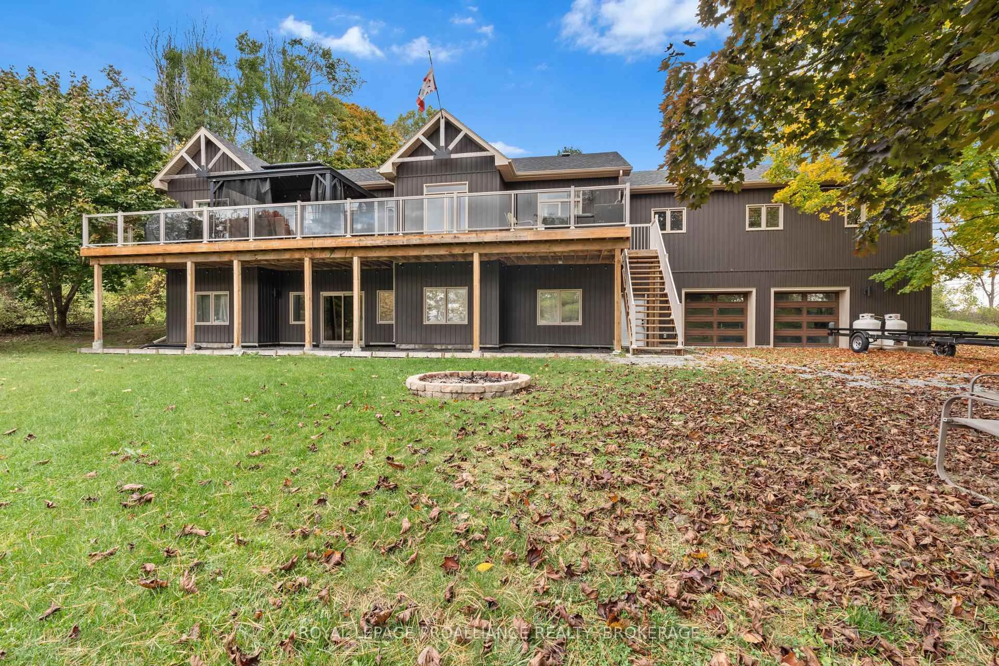 A pic from outside/outdoor area/front of a property/back of a property/a pic from drone, water/lake/river/ocean view for 1888 Sunbury Rd, Inverary Ontario K0H 1X0
