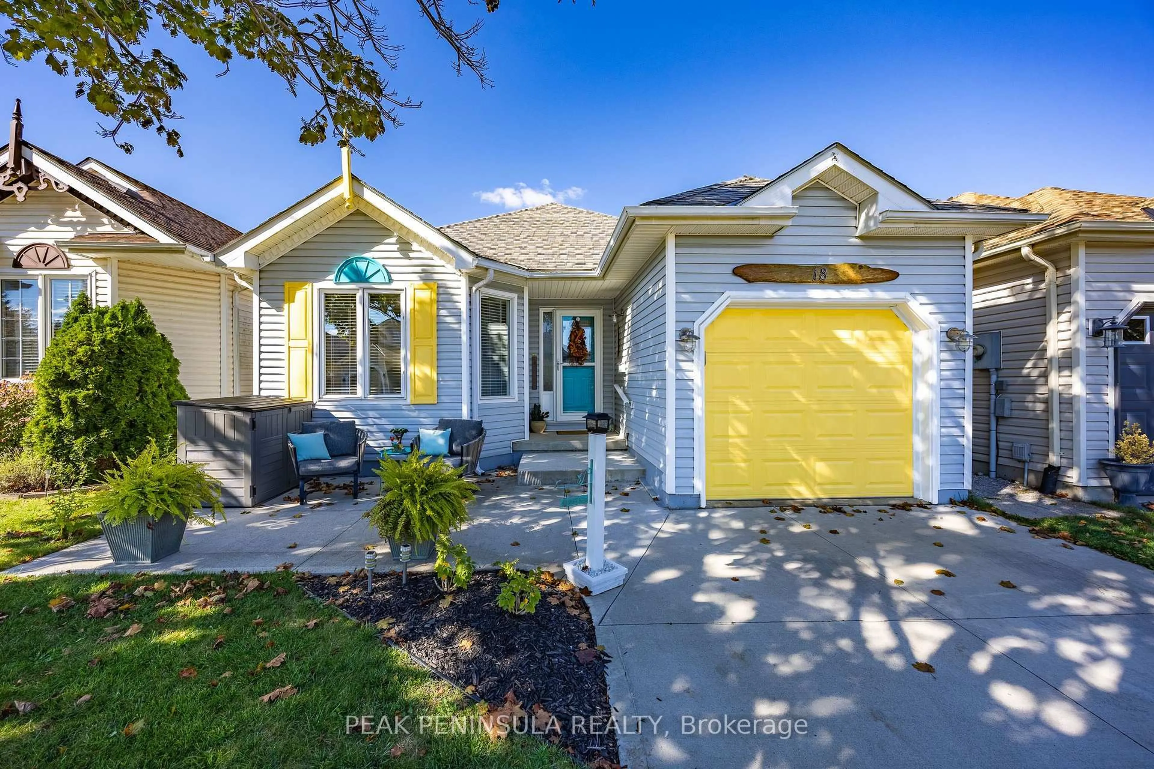 Home with vinyl exterior material, street for 18 Long Point Blvd, Norfolk Ontario N0E 1M0