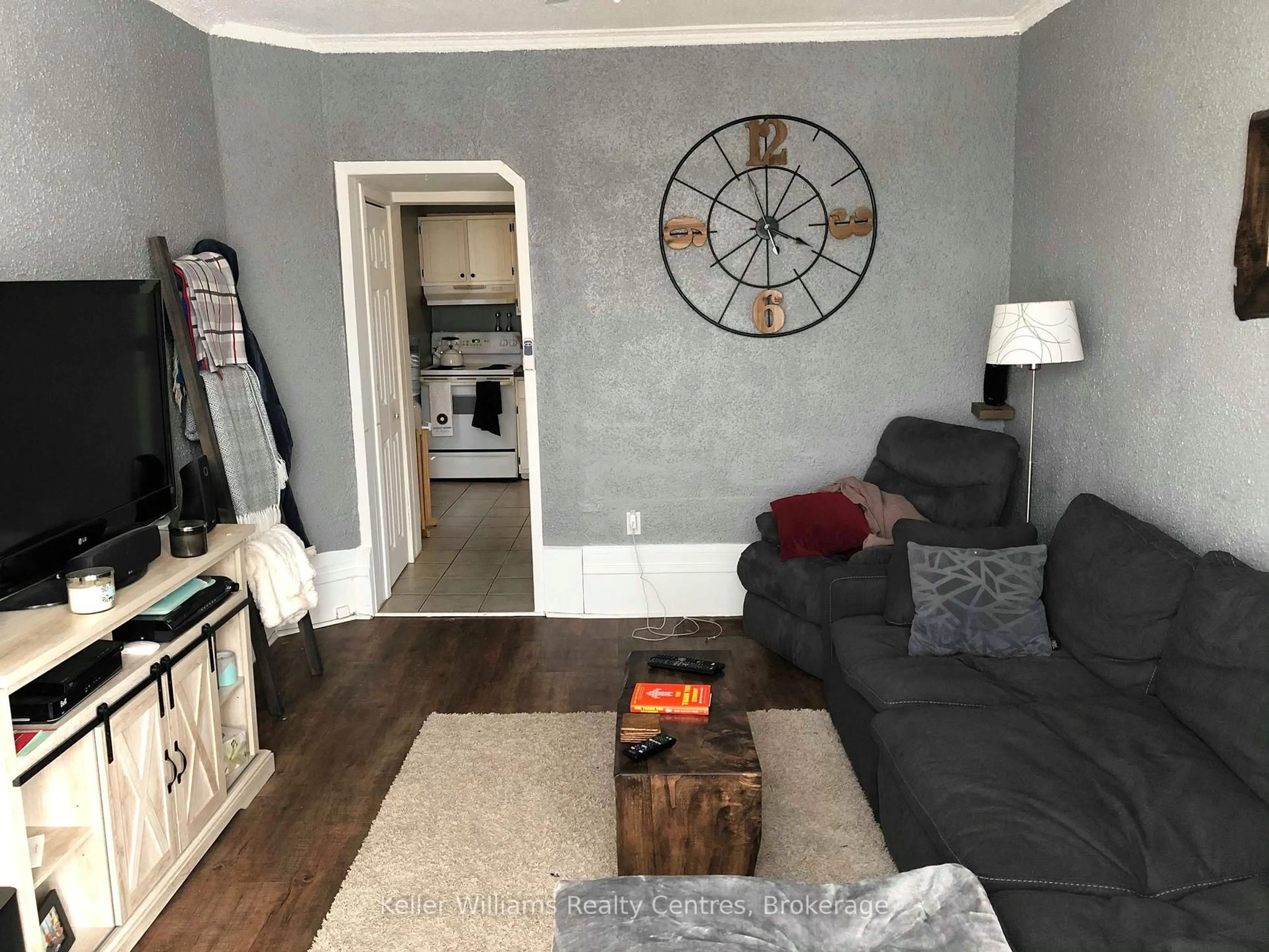 Living room with furniture, wood/laminate floor for 1379 3rd Ave, Owen Sound Ontario N4K 2L8