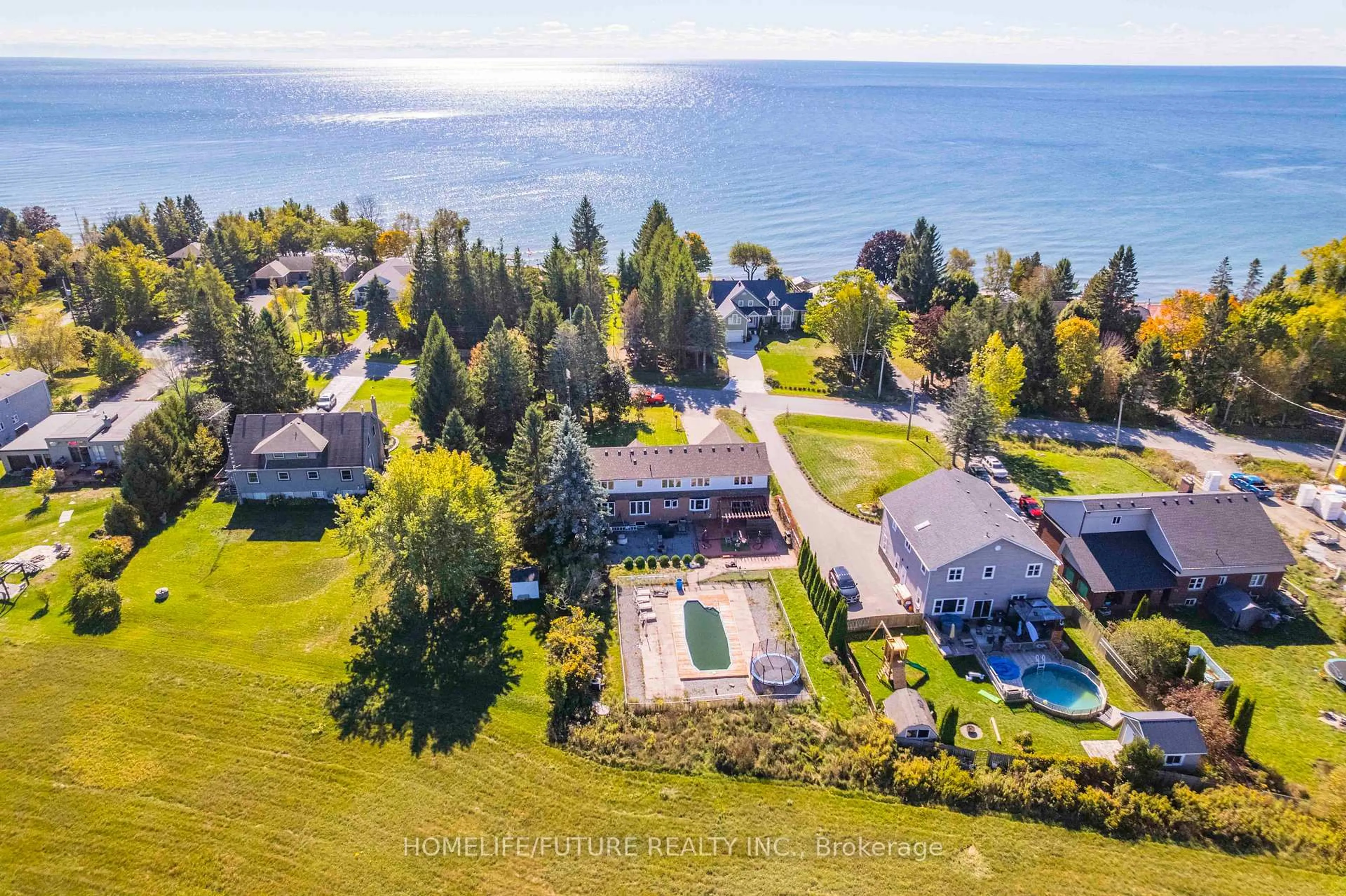 A pic from outside/outdoor area/front of a property/back of a property/a pic from drone, water/lake/river/ocean view for 120 North Shore Rd, Alnwick/Haldimand Ontario K0K 2G0