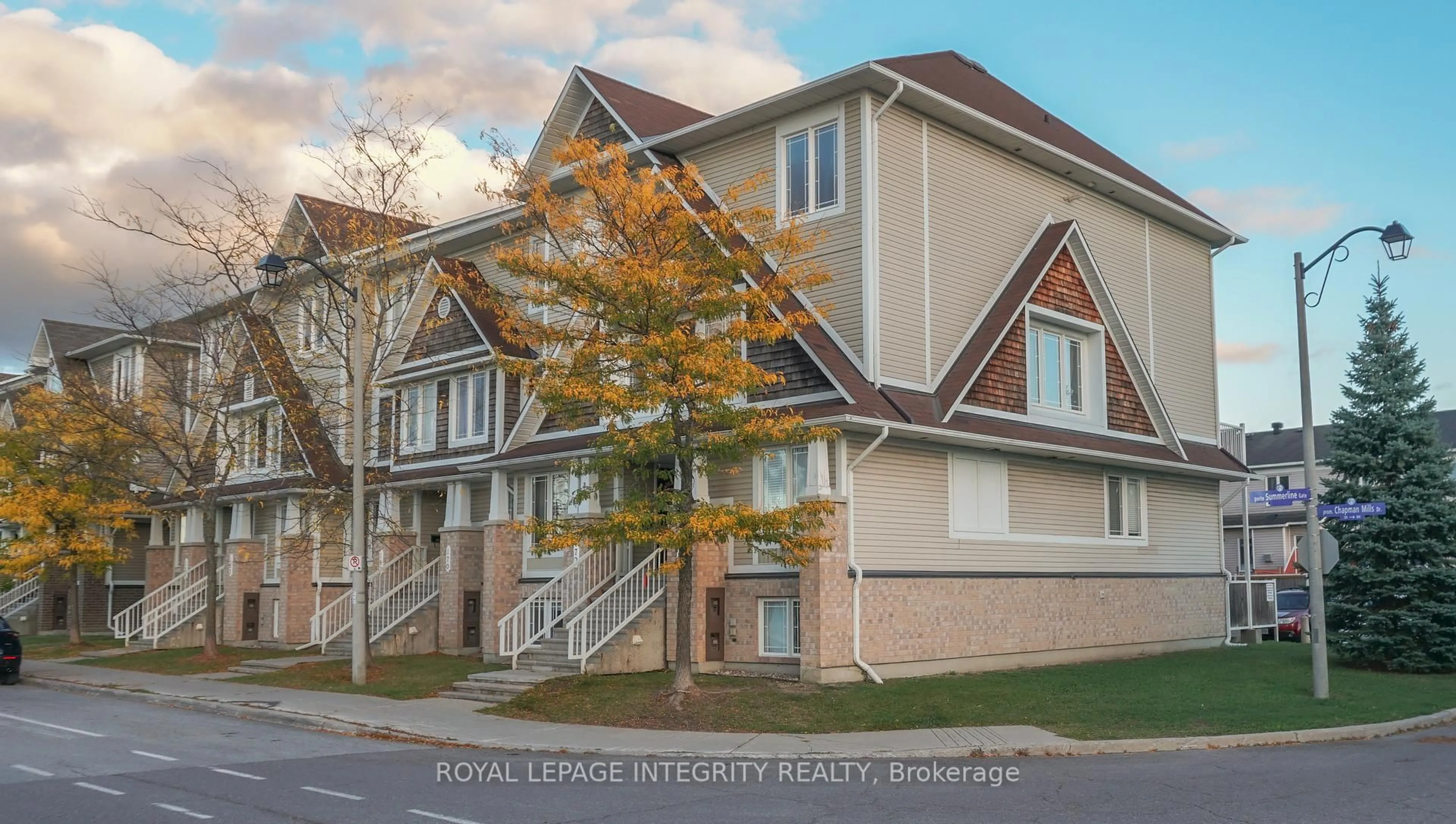 Home with vinyl exterior material, street for 176 Chapman Mills Dr, Ottawa Ontario K2J 0B8