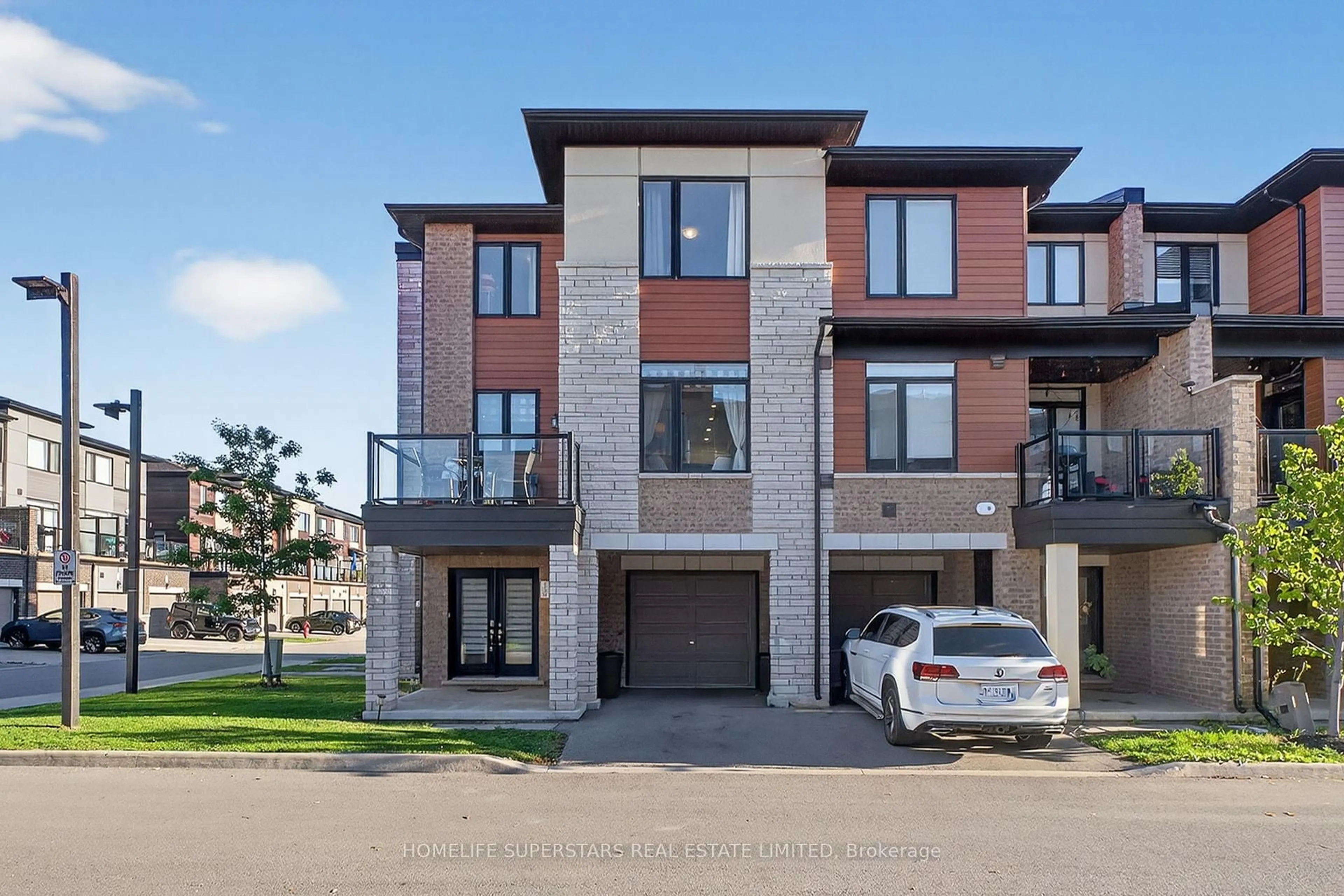 Home with brick exterior material, street for 590 NORTH SERVICE Rd #130, Hamilton Ontario L8E 0K5