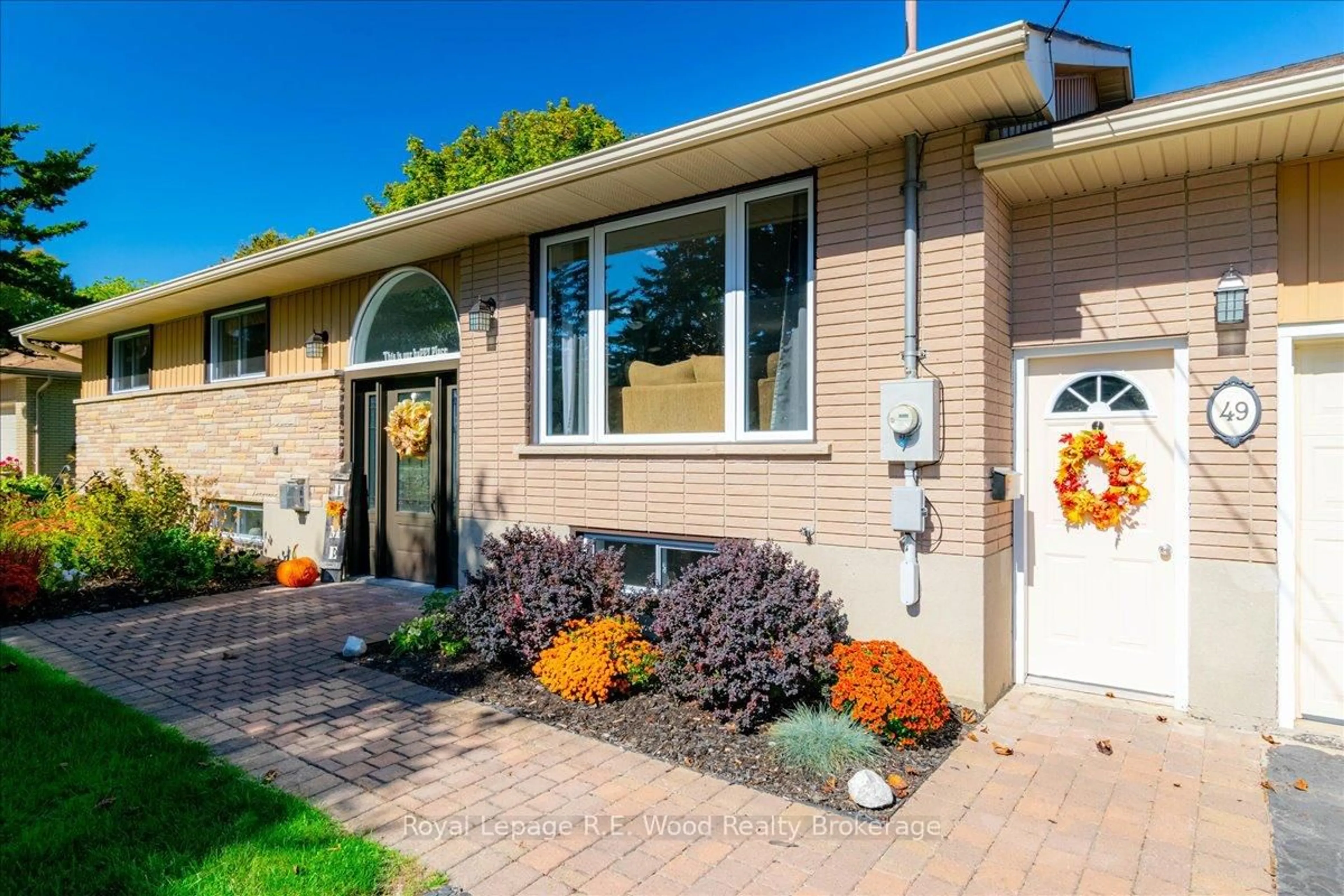 Home with brick exterior material, street for 49 Dereham Dr, Tillsonburg Ontario N4G 2B1