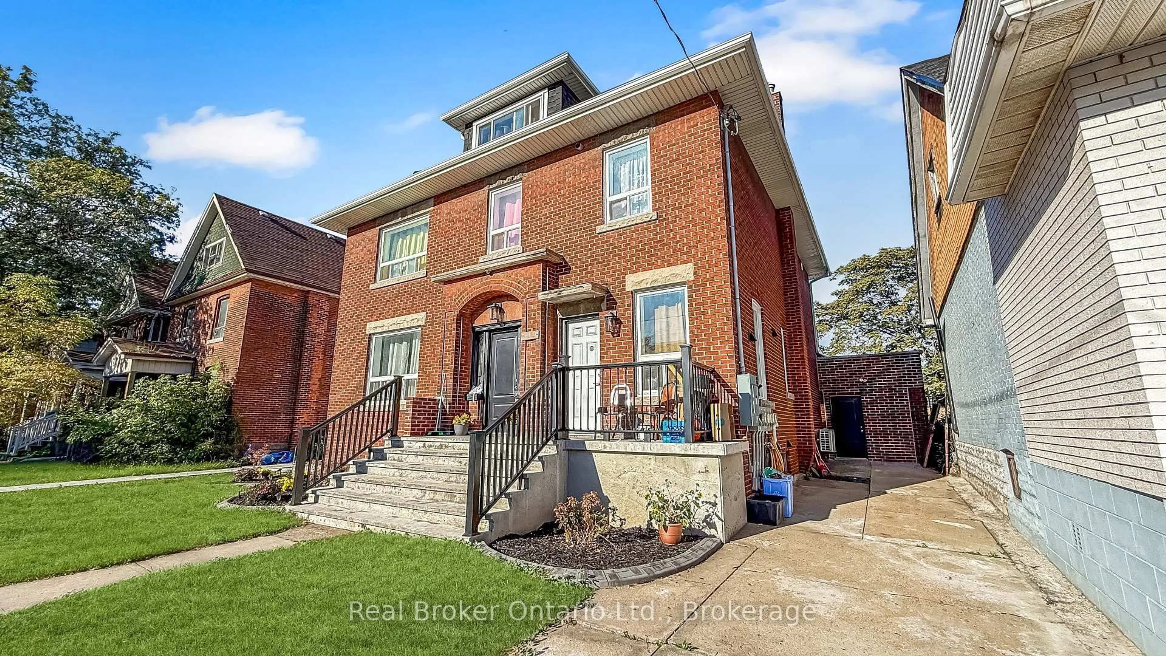 Home with brick exterior material, street for 119 Ottawa St, Hamilton Ontario L8H 3Y9