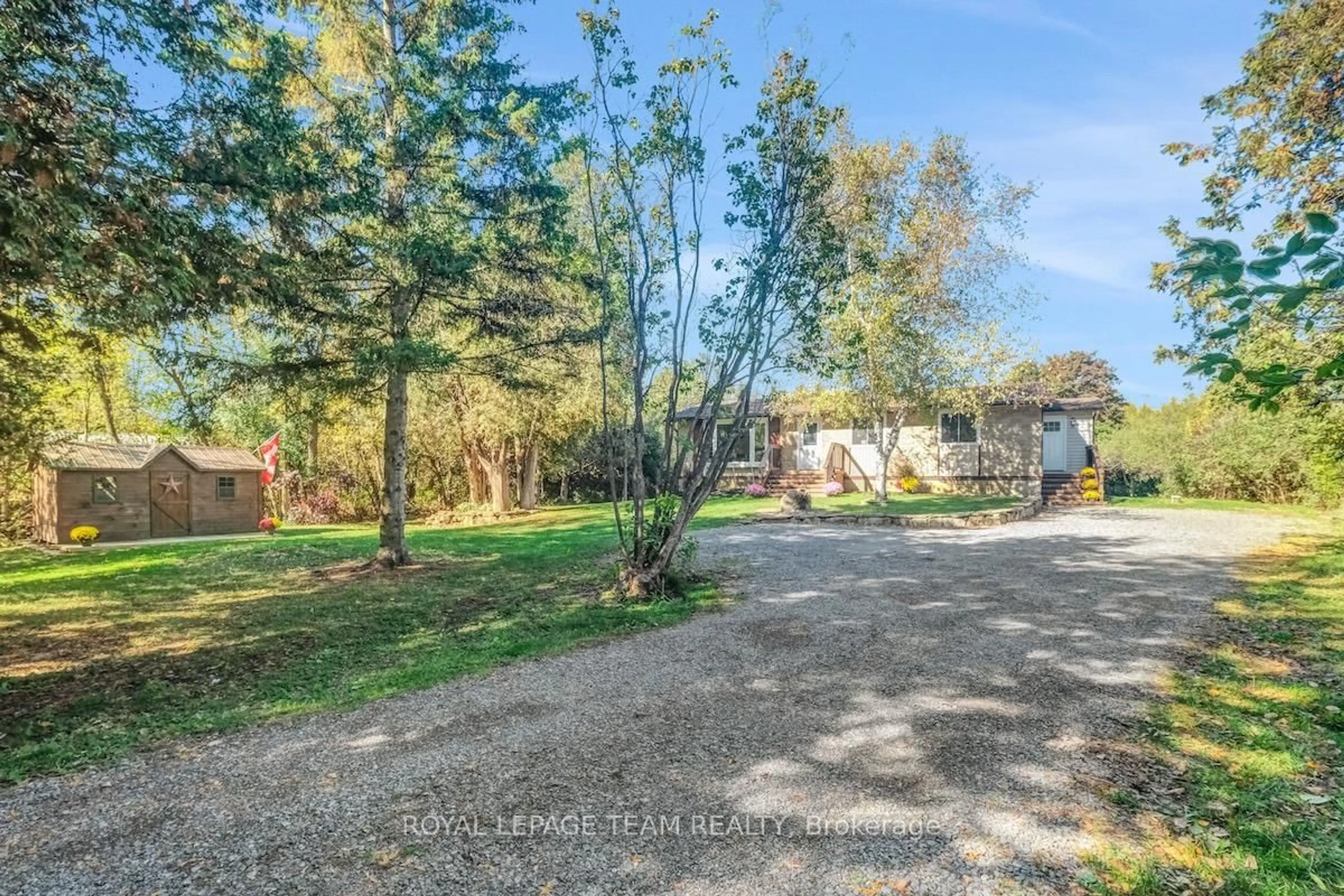 A pic from outside/outdoor area/front of a property/back of a property/a pic from drone, forest/trees view for 491 Lake Ave, Carleton Place Ontario K7C 3S7
