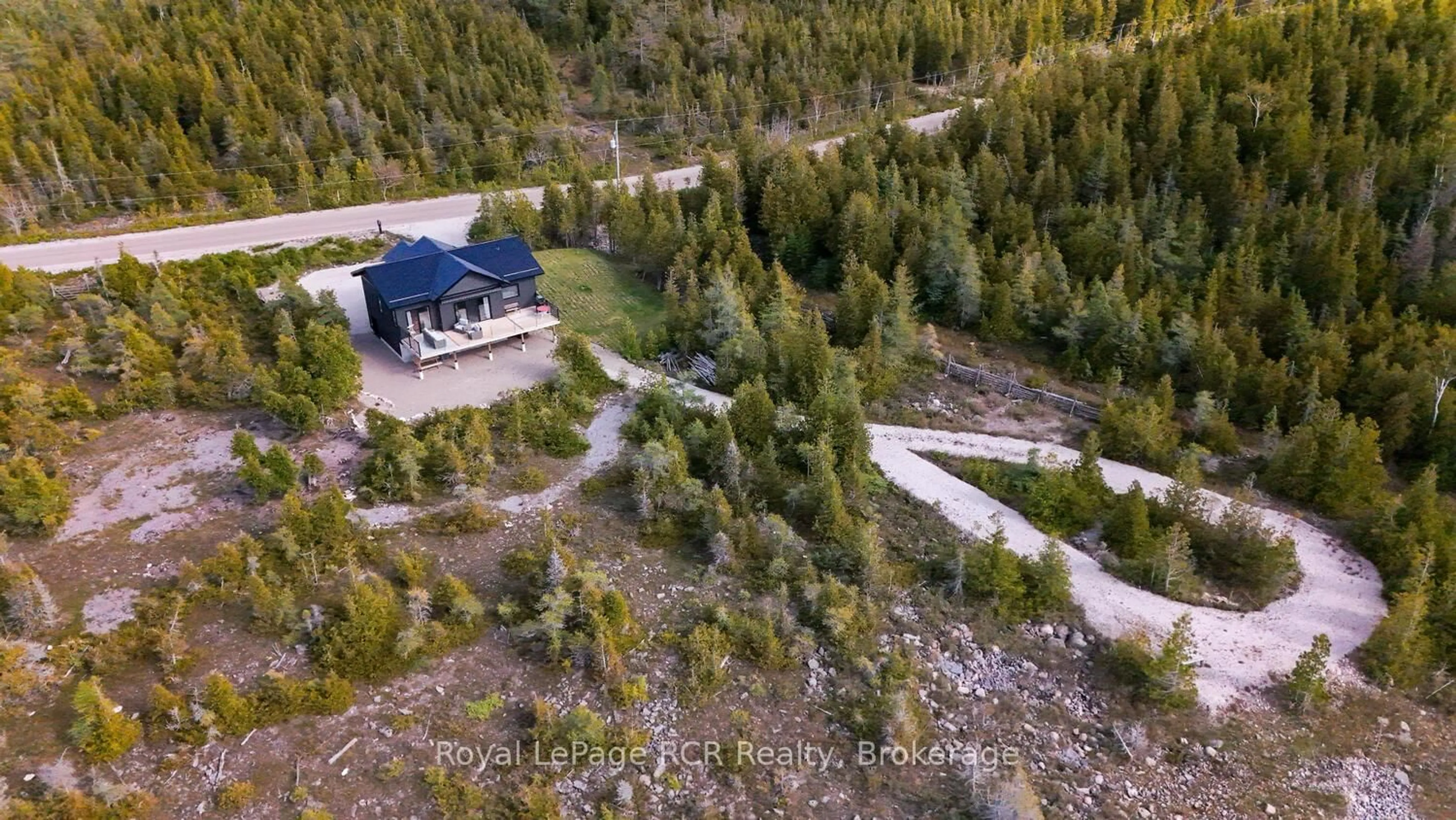 A pic from outside/outdoor area/front of a property/back of a property/a pic from drone, forest/trees view for 43 Sadler Creek Rd, Northern Bruce Peninsula Ontario N0H 1Z0