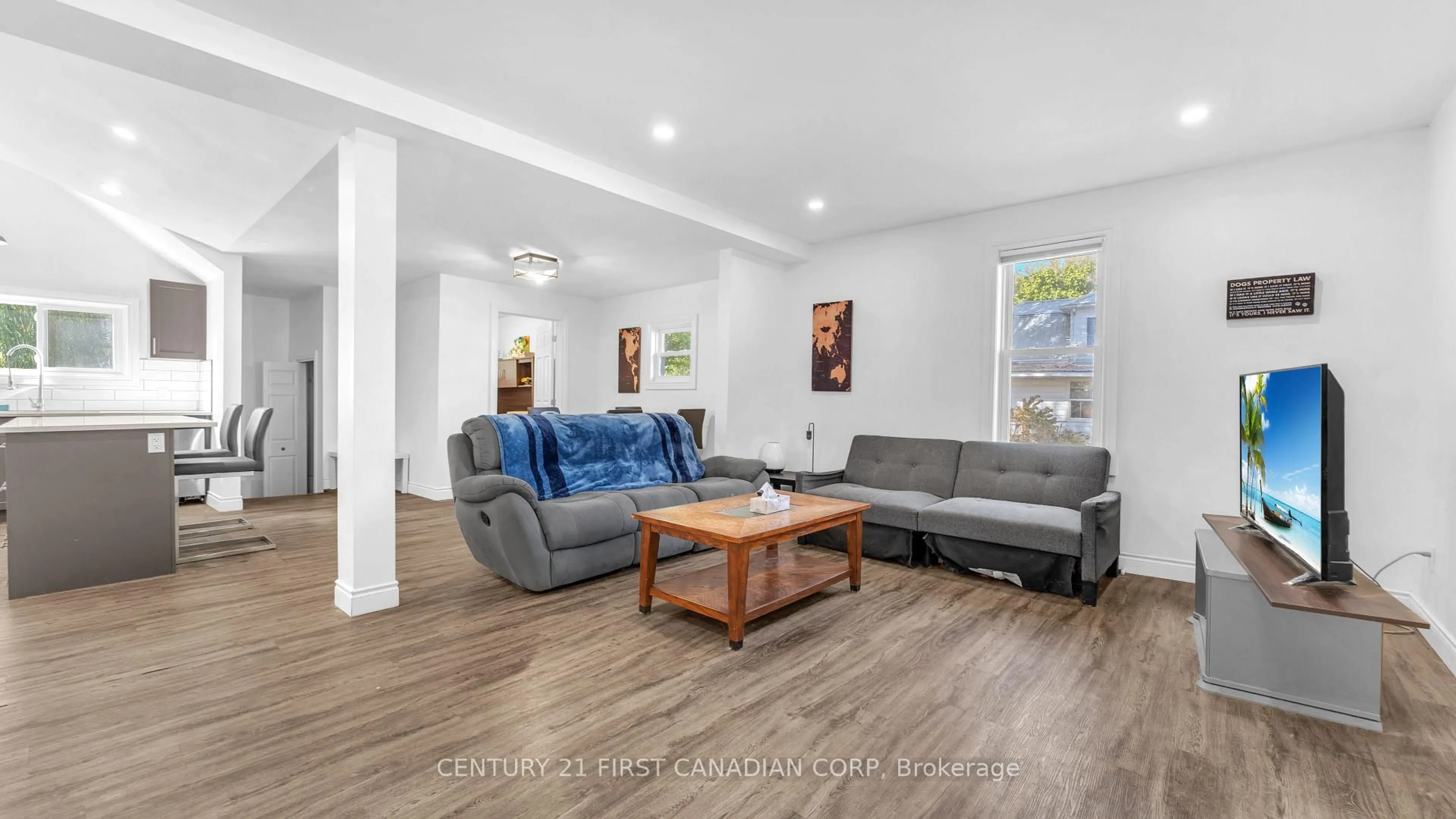 Living room with furniture, wood/laminate floor for 2583 Kelly Rd, Oil Springs Ontario N0N 1P0