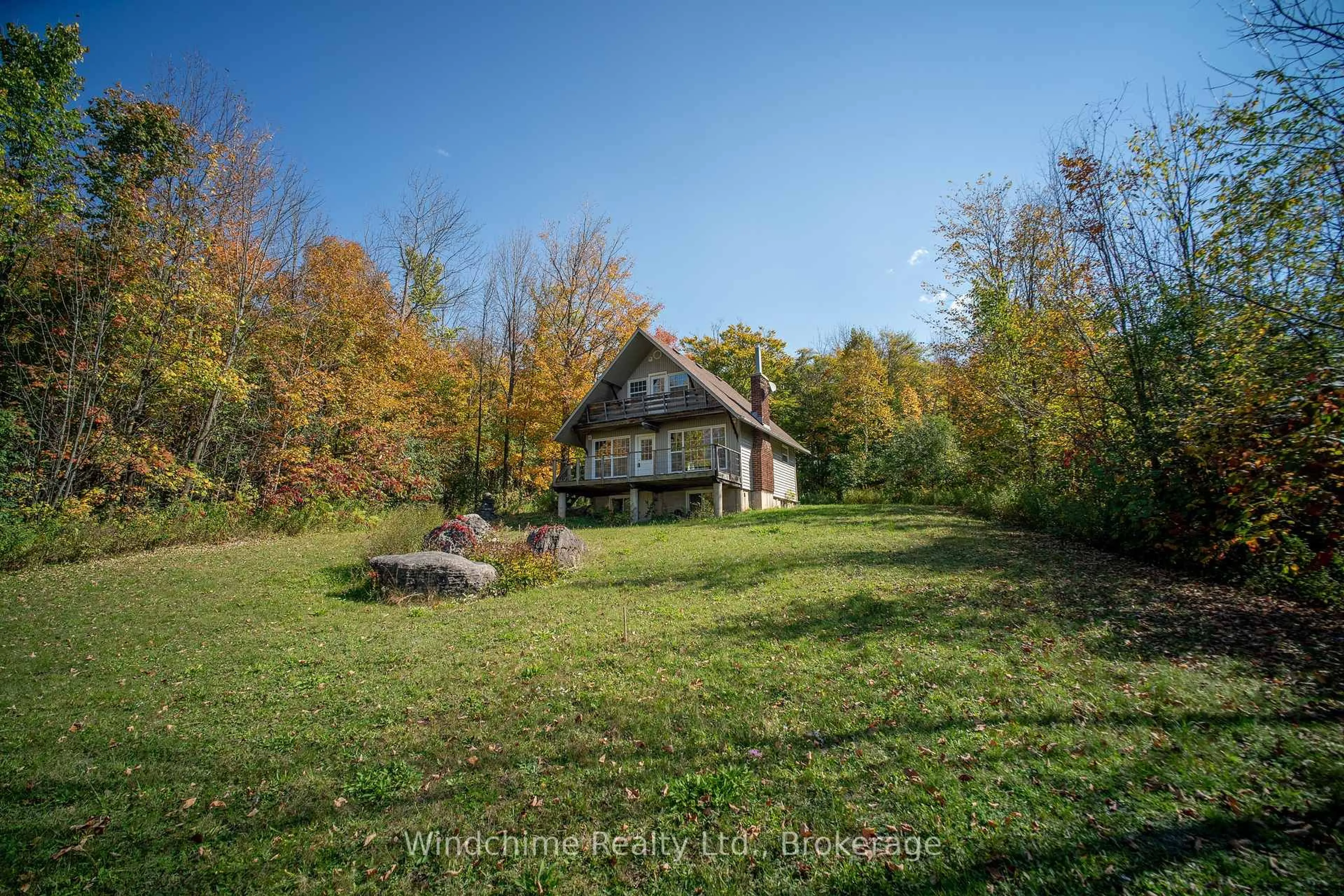 A pic from outside/outdoor area/front of a property/back of a property/a pic from drone, unknown for 110 Old Baldy Access Rd, Grey Highlands Ontario N0C 1G0