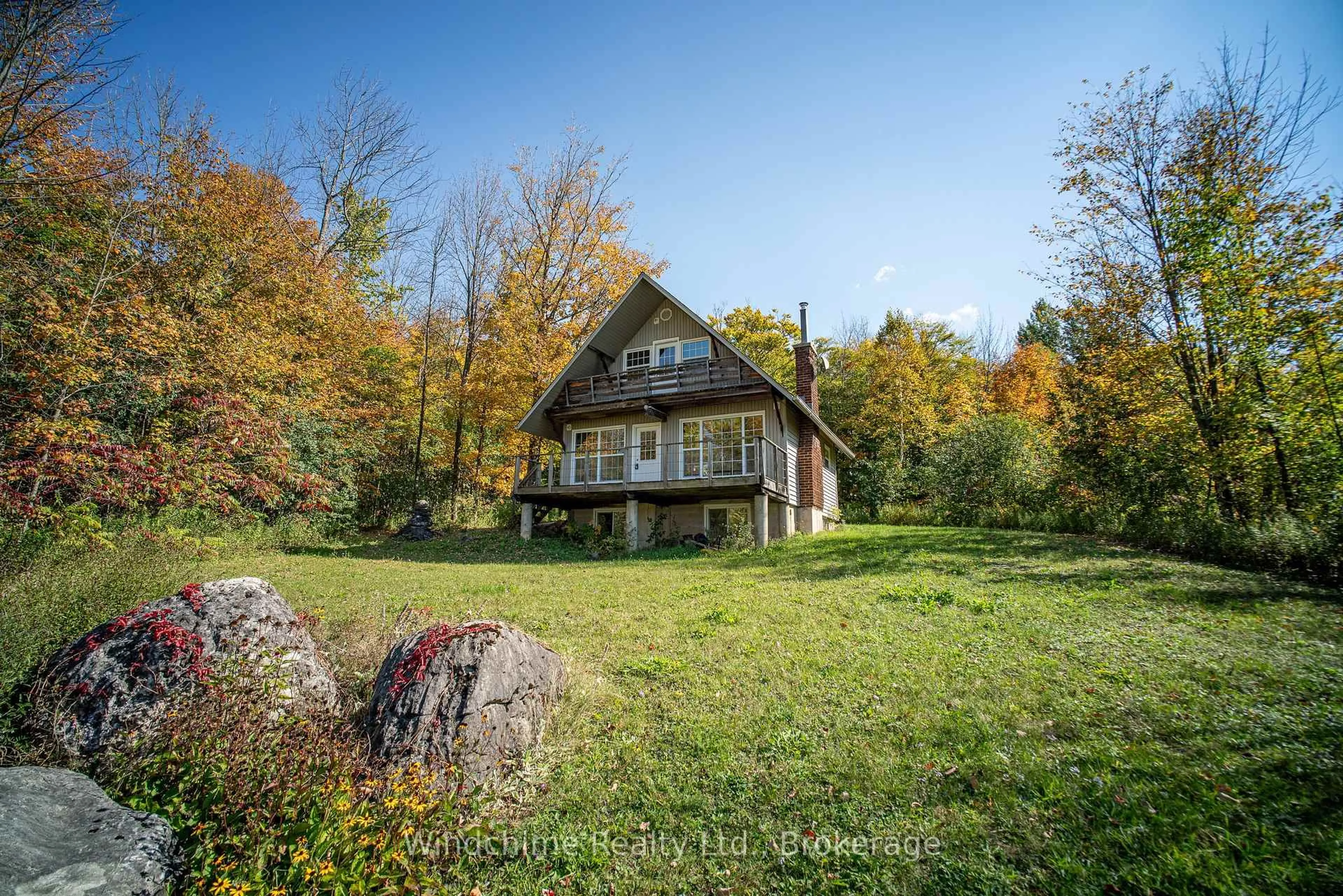 A pic from outside/outdoor area/front of a property/back of a property/a pic from drone, unknown for 110 Old Baldy Access Rd, Grey Highlands Ontario N0C 1G0