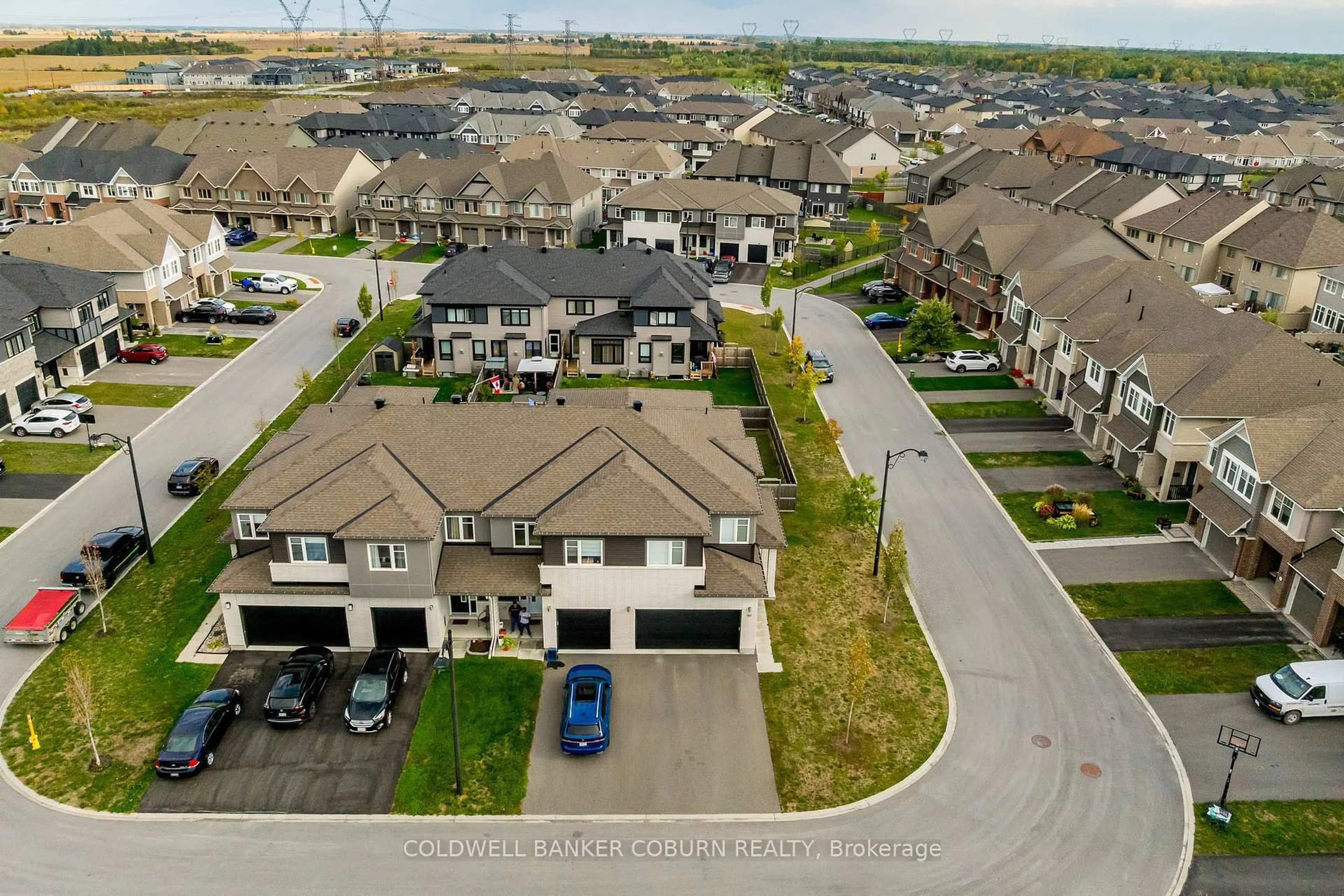 A pic from outside/outdoor area/front of a property/back of a property/a pic from drone, street for 161 Jardiniere St, Ottawa Ontario K2S 2K1