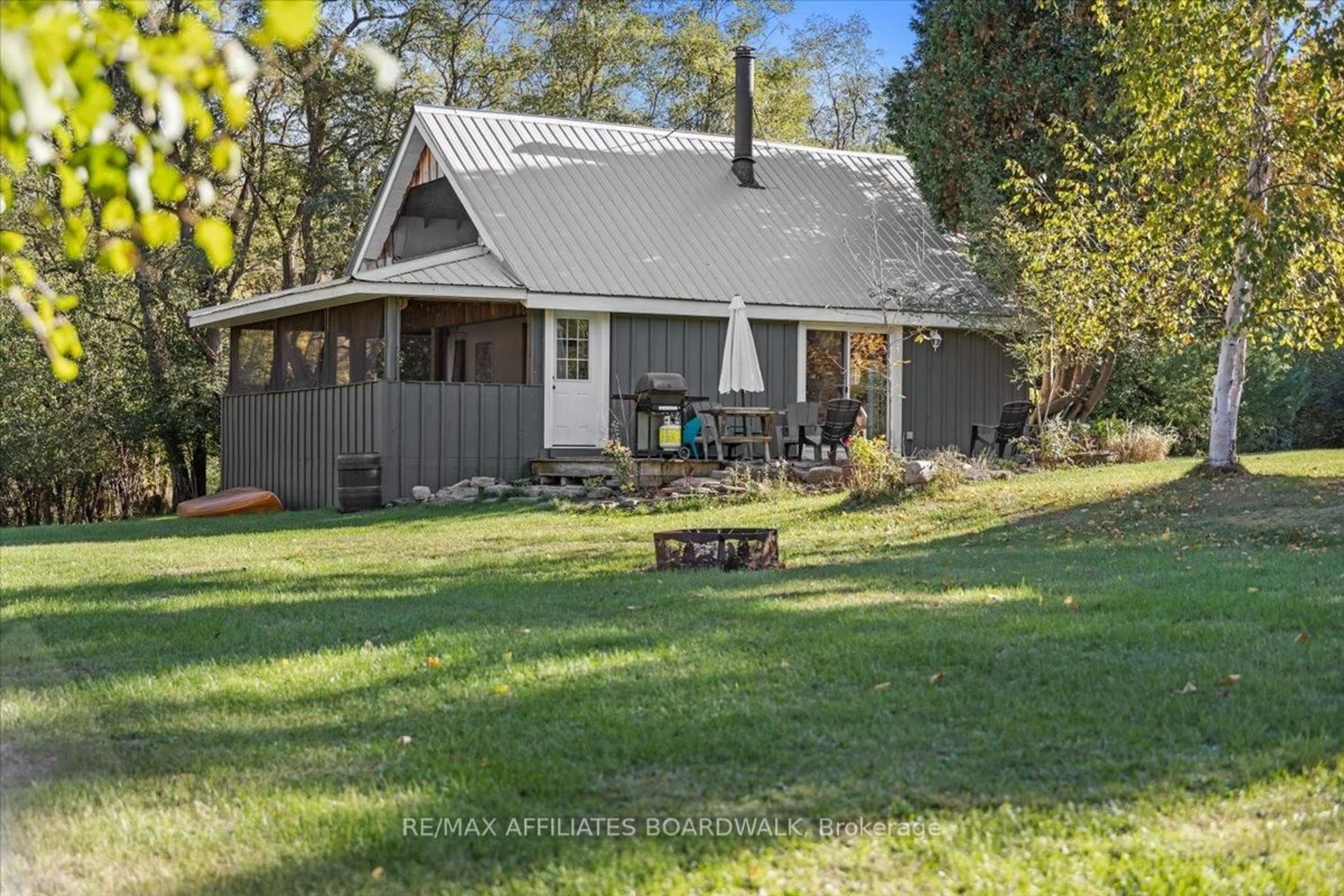 A pic from outside/outdoor area/front of a property/back of a property/a pic from drone, unknown for 402 Mp4 Rd, Rideau Lakes Ontario K0G 1V0