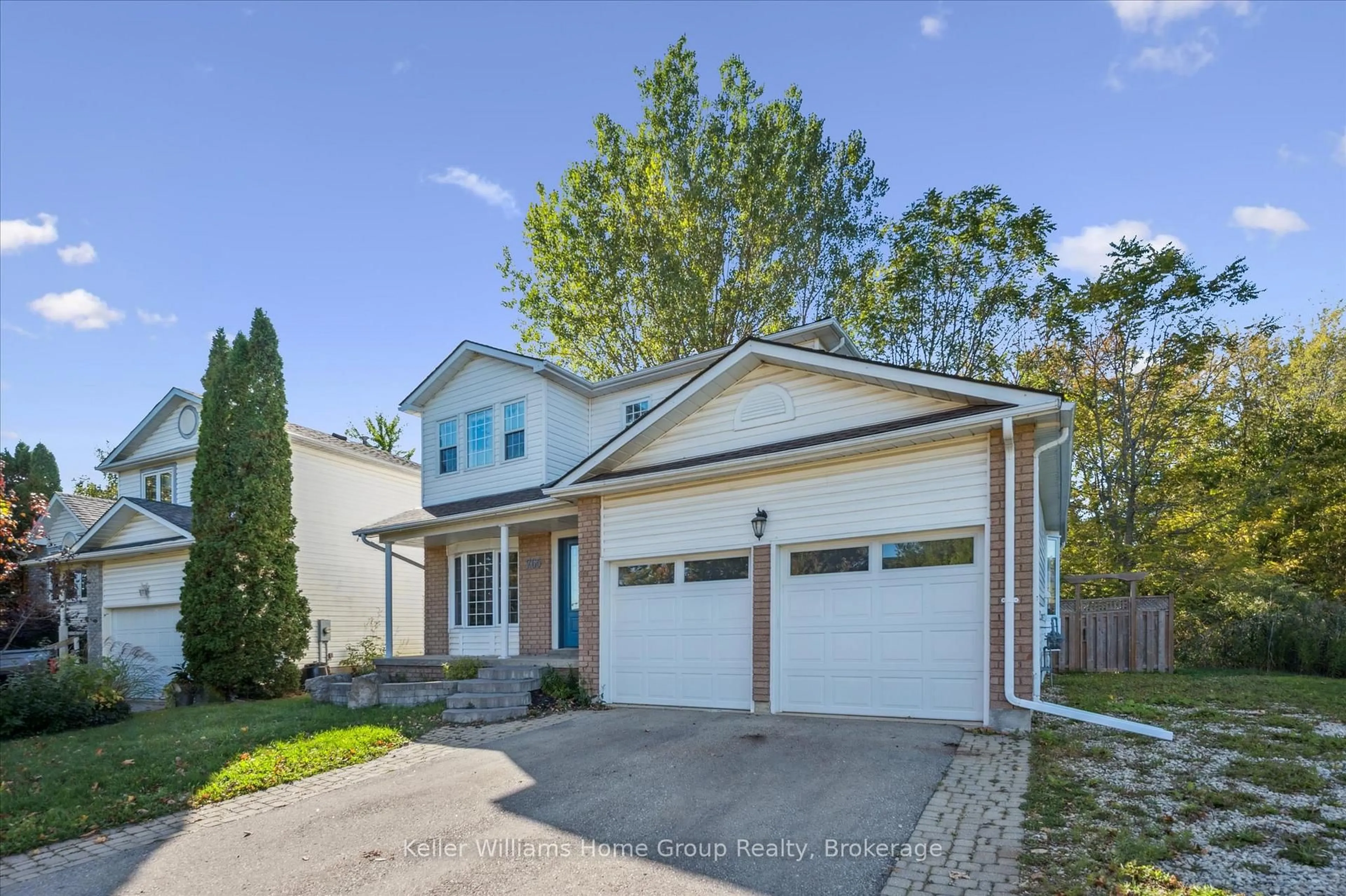 Home with vinyl exterior material, street for 765 Woodhill Dr, Centre Wellington Ontario N1M 3N2