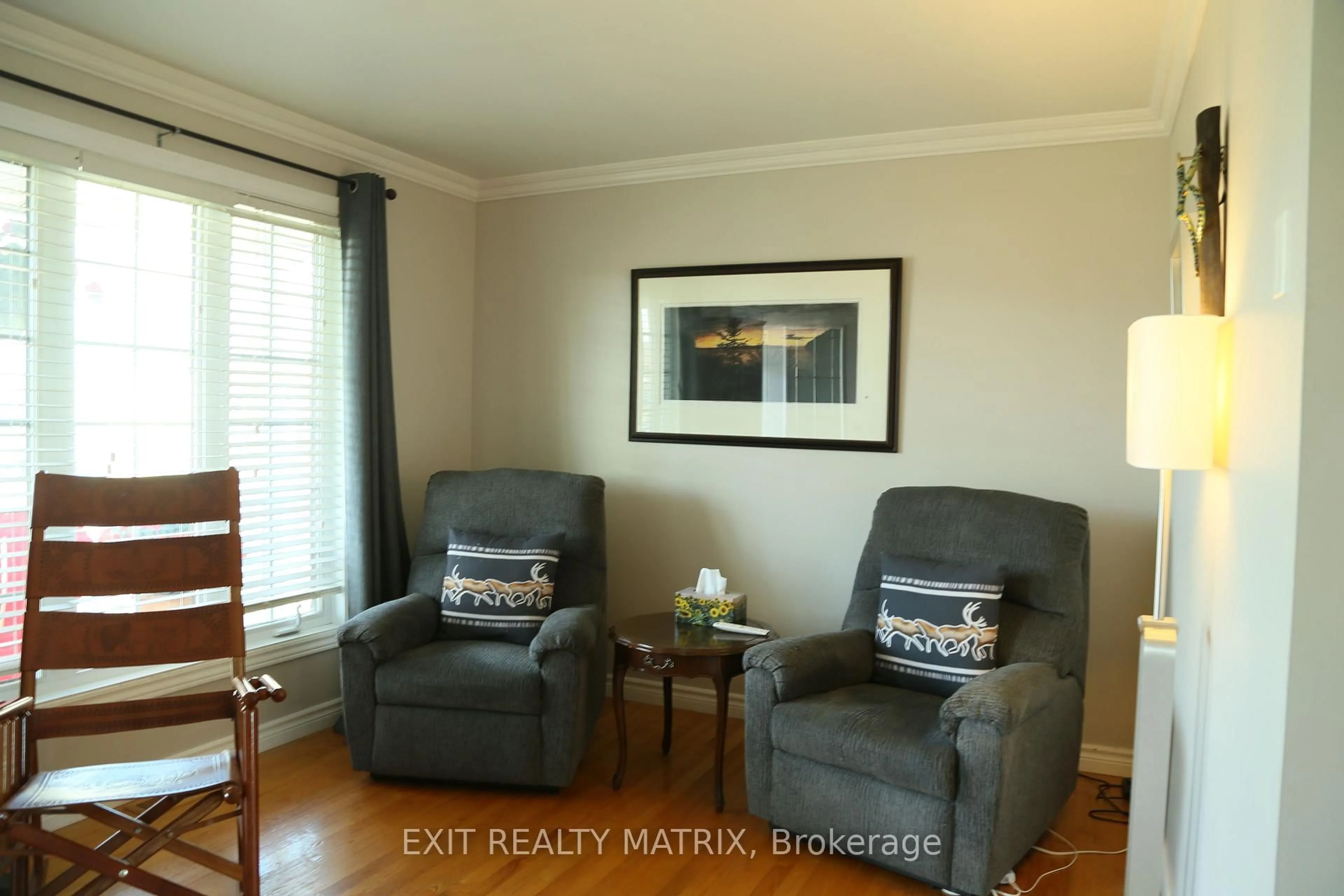 Living room with furniture, wood/laminate floor for 697 Omer St, Hawkesbury Ontario K6A 3G1