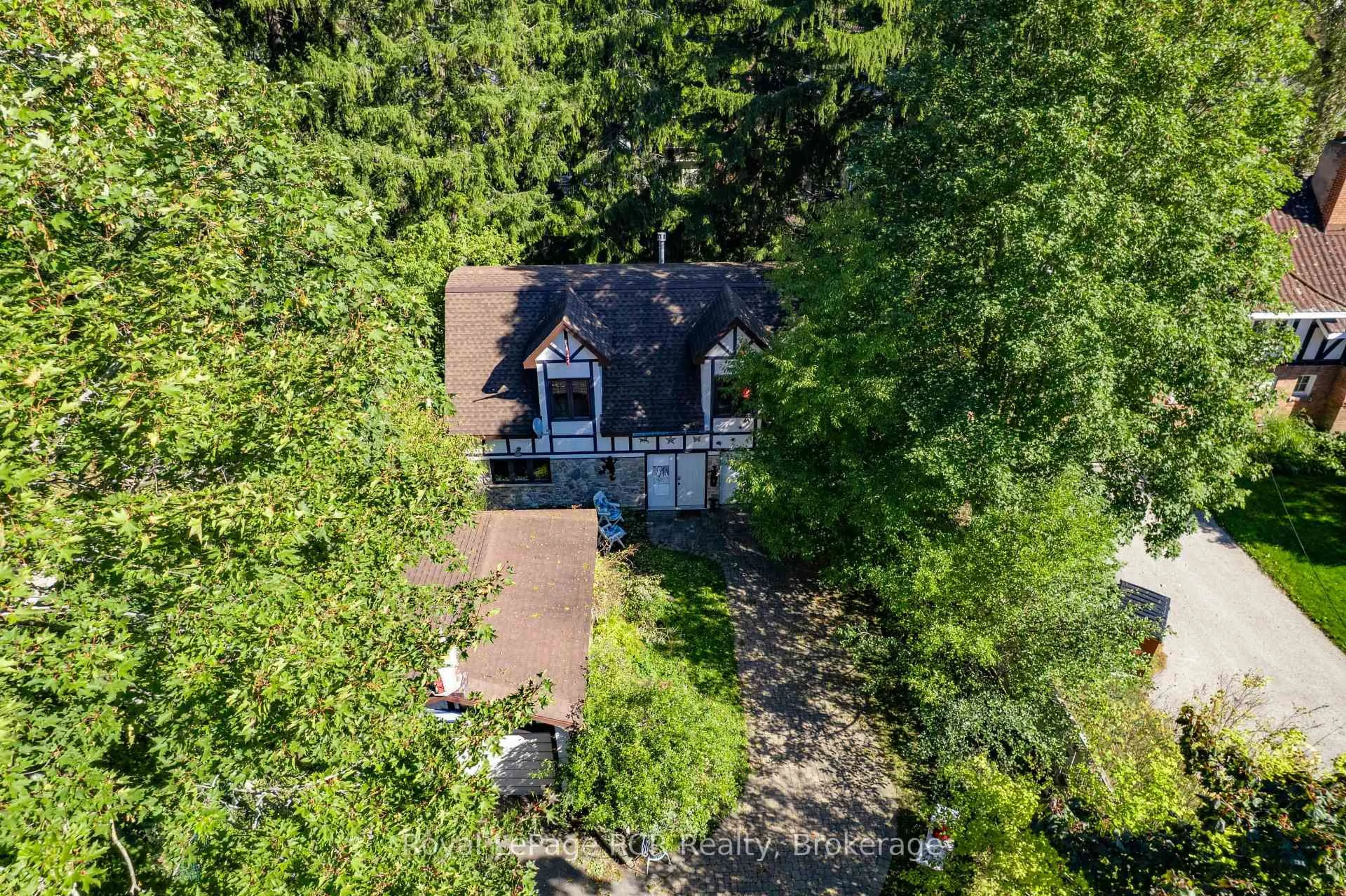 A pic from outside/outdoor area/front of a property/back of a property/a pic from drone, forest/trees view for 1069 4th Ave, Owen Sound Ontario N4K 4W1