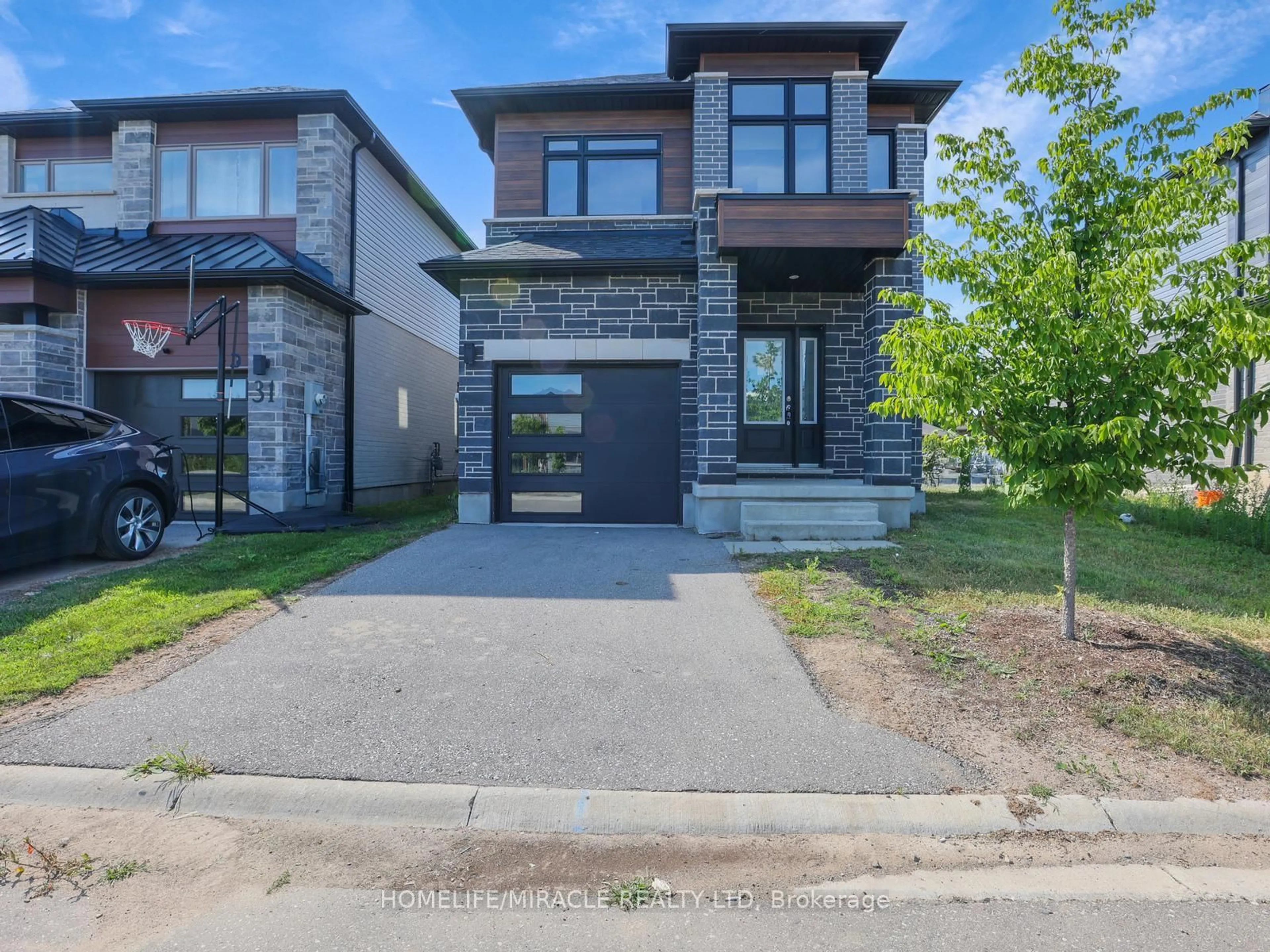 Home with brick exterior material, street for 29 Ferris Circ, Guelph Ontario N1G 0H2