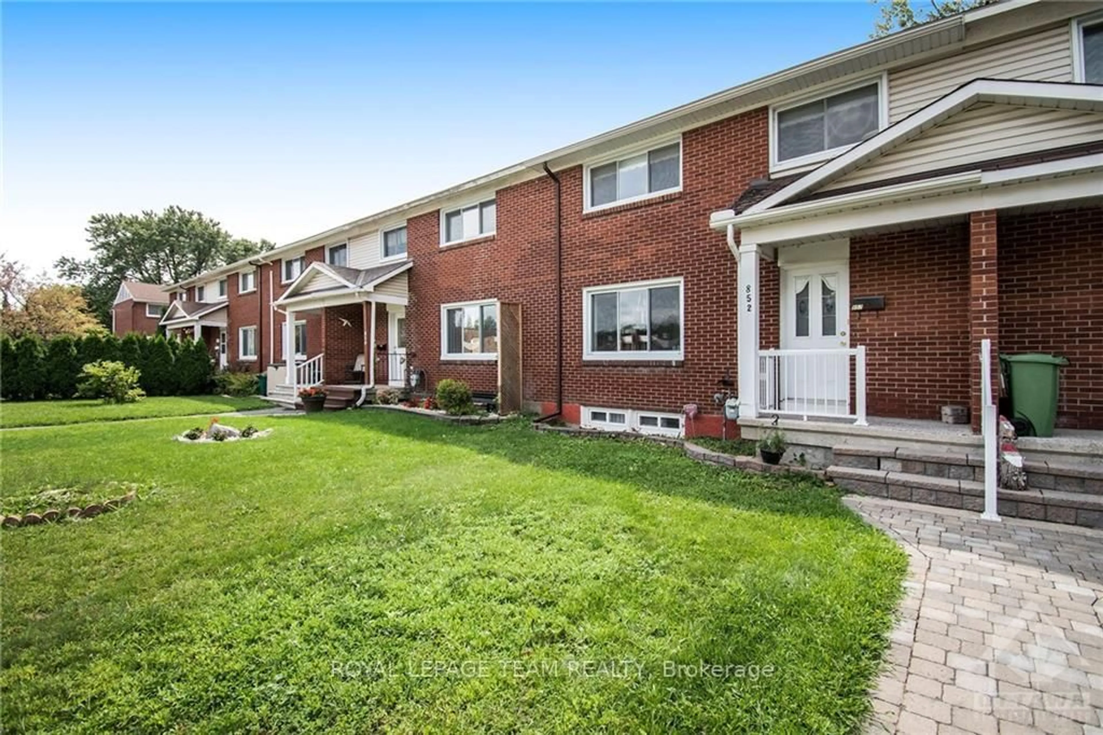 Home with brick exterior material, street for 852 Cummings Ave, Ottawa Ontario K1K 2L4