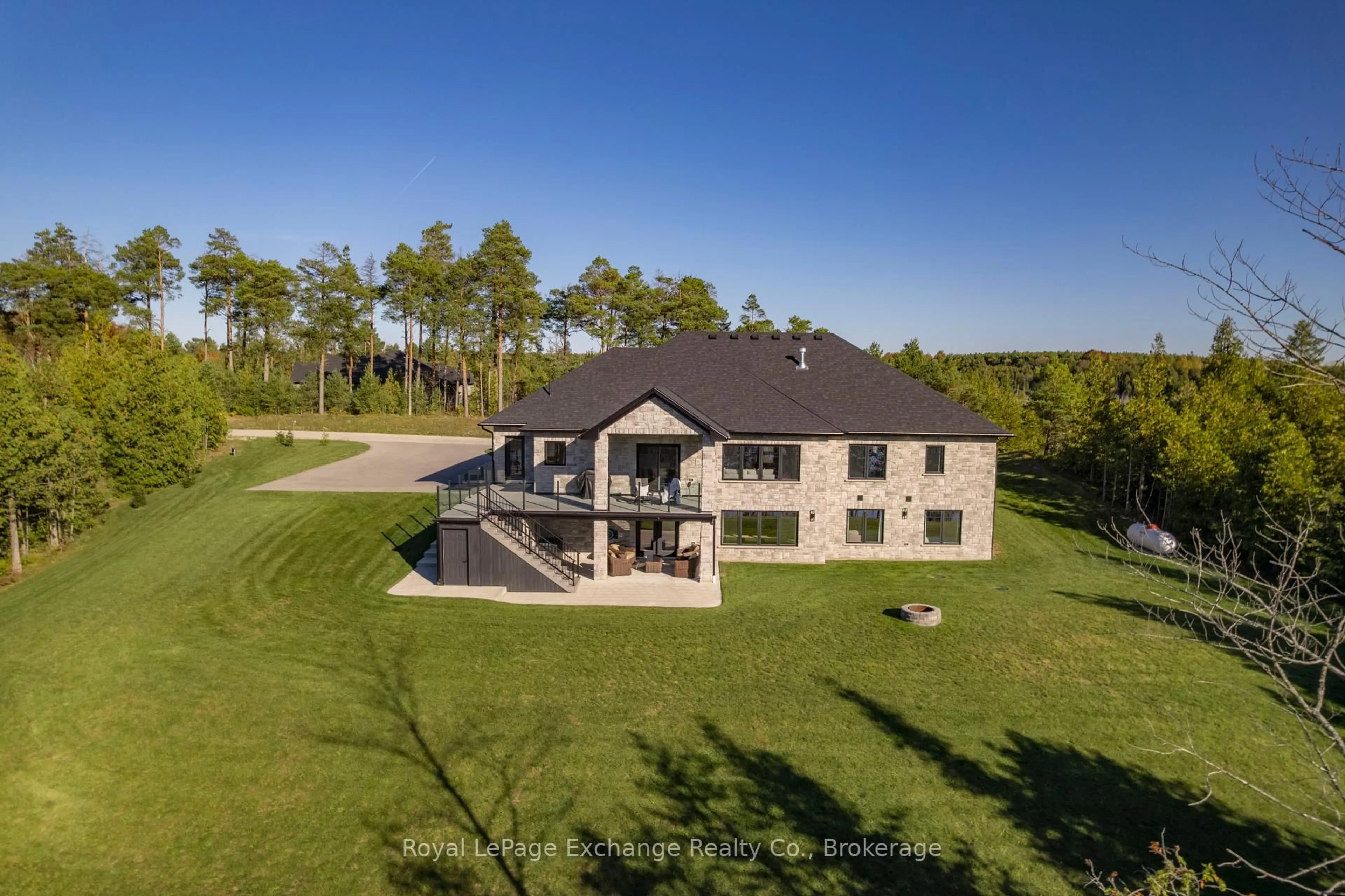 A pic from outside/outdoor area/front of a property/back of a property/a pic from drone, unknown for 150 Louise Creek Cres, West Grey Ontario N0G 1S0