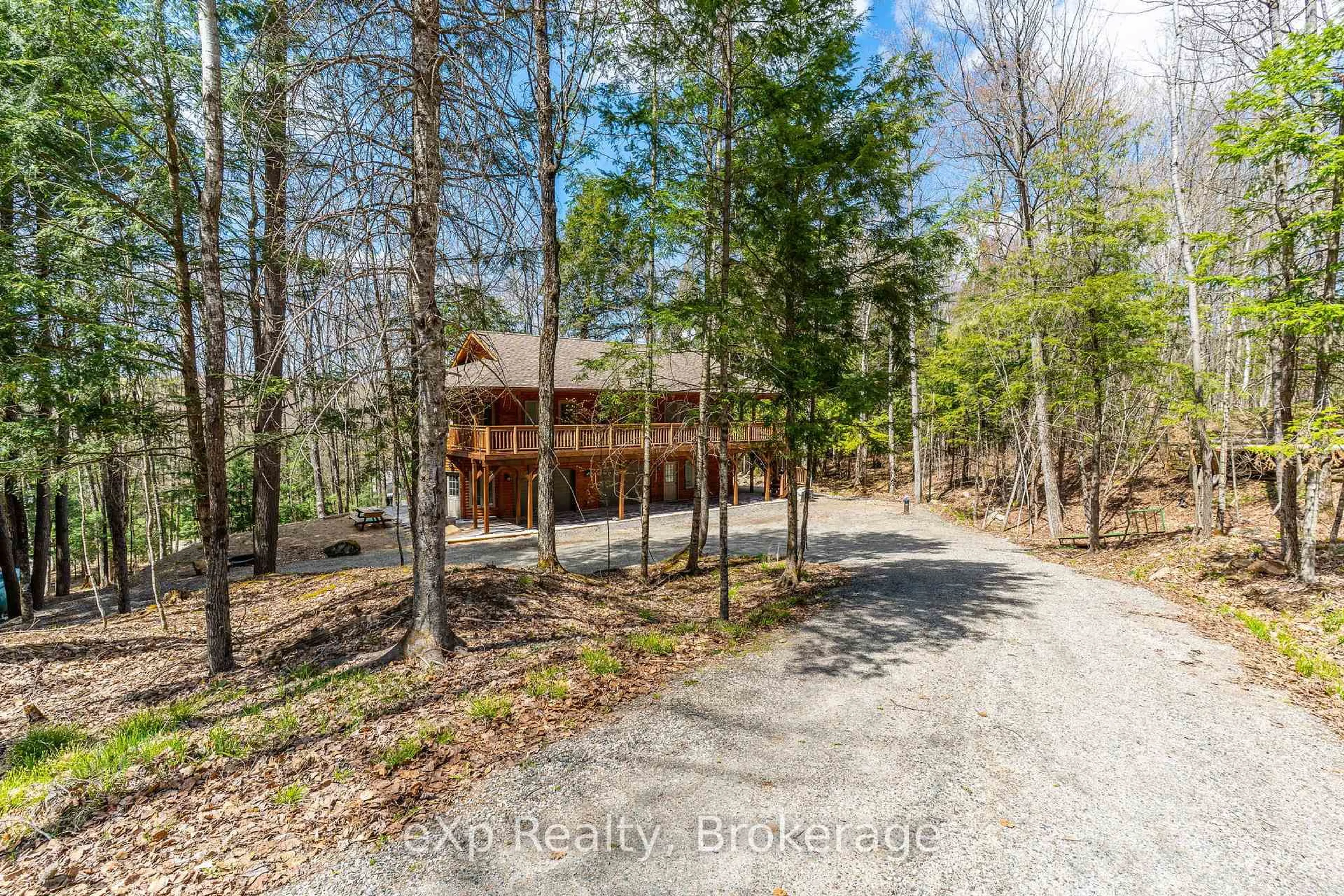A pic from outside/outdoor area/front of a property/back of a property/a pic from drone, forest/trees view for 35 Keefer St, Dysart et al Ontario K0M 1S0