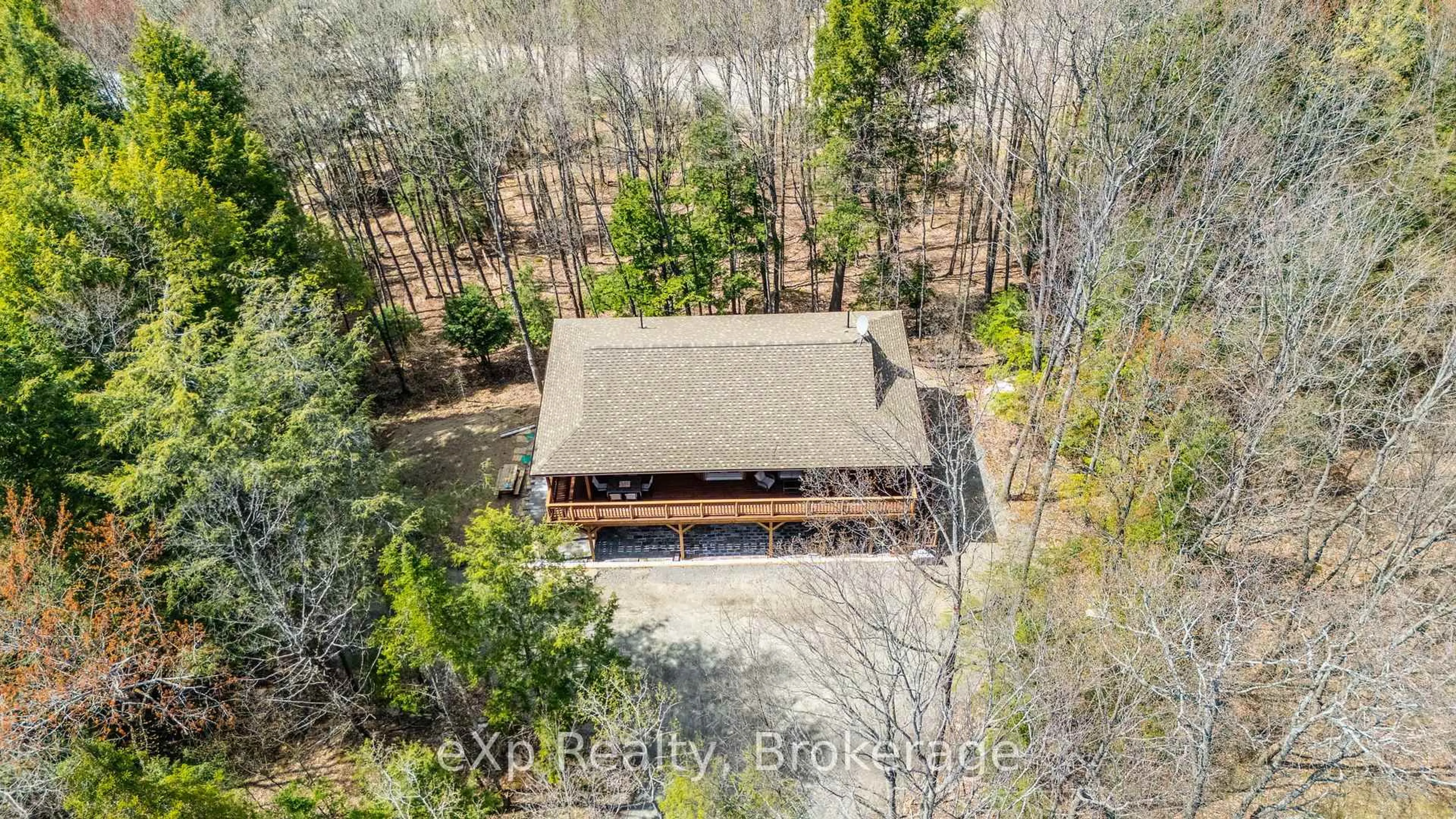 A pic from outside/outdoor area/front of a property/back of a property/a pic from drone, forest/trees view for 35 Keefer St, Dysart et al Ontario K0M 1S0