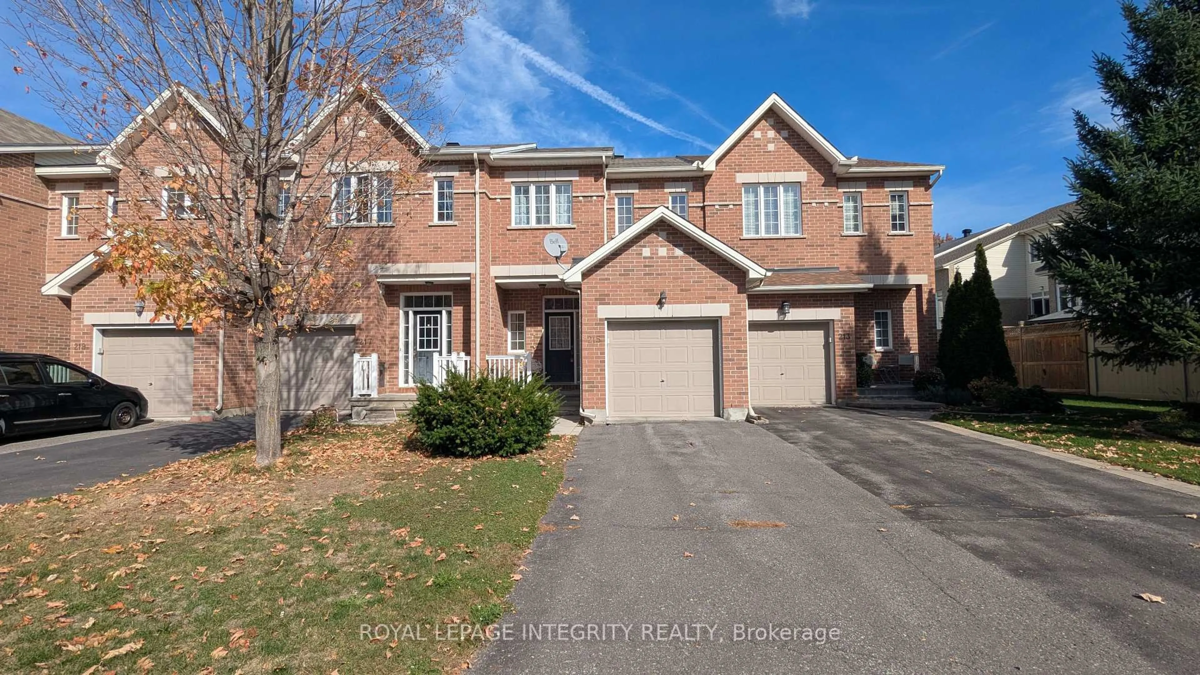 Home with brick exterior material, street for 215 Badgeley Ave, Ottawa Ontario K2T 0A4