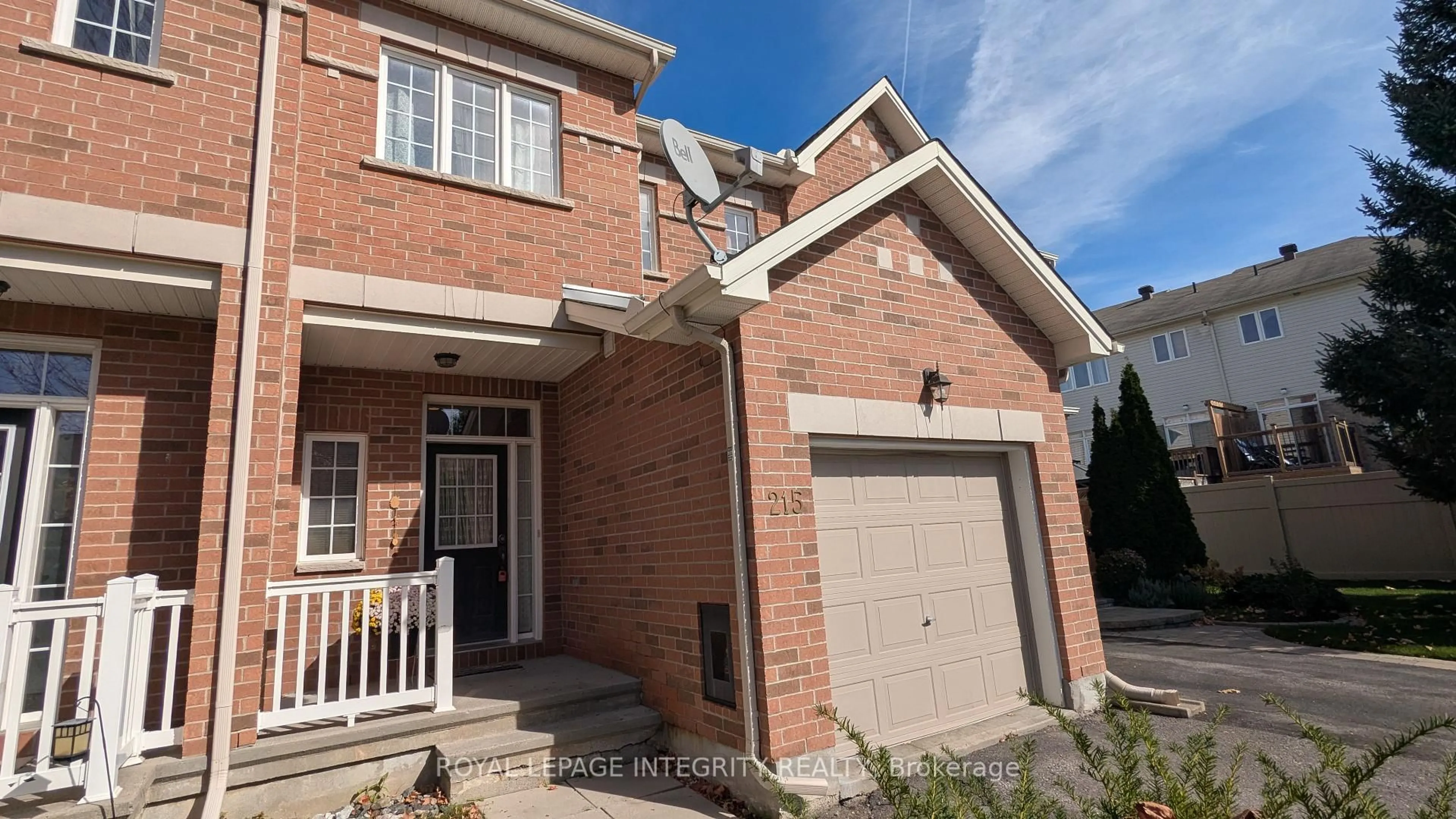 Home with brick exterior material, street for 215 Badgeley Ave, Ottawa Ontario K2T 0A4