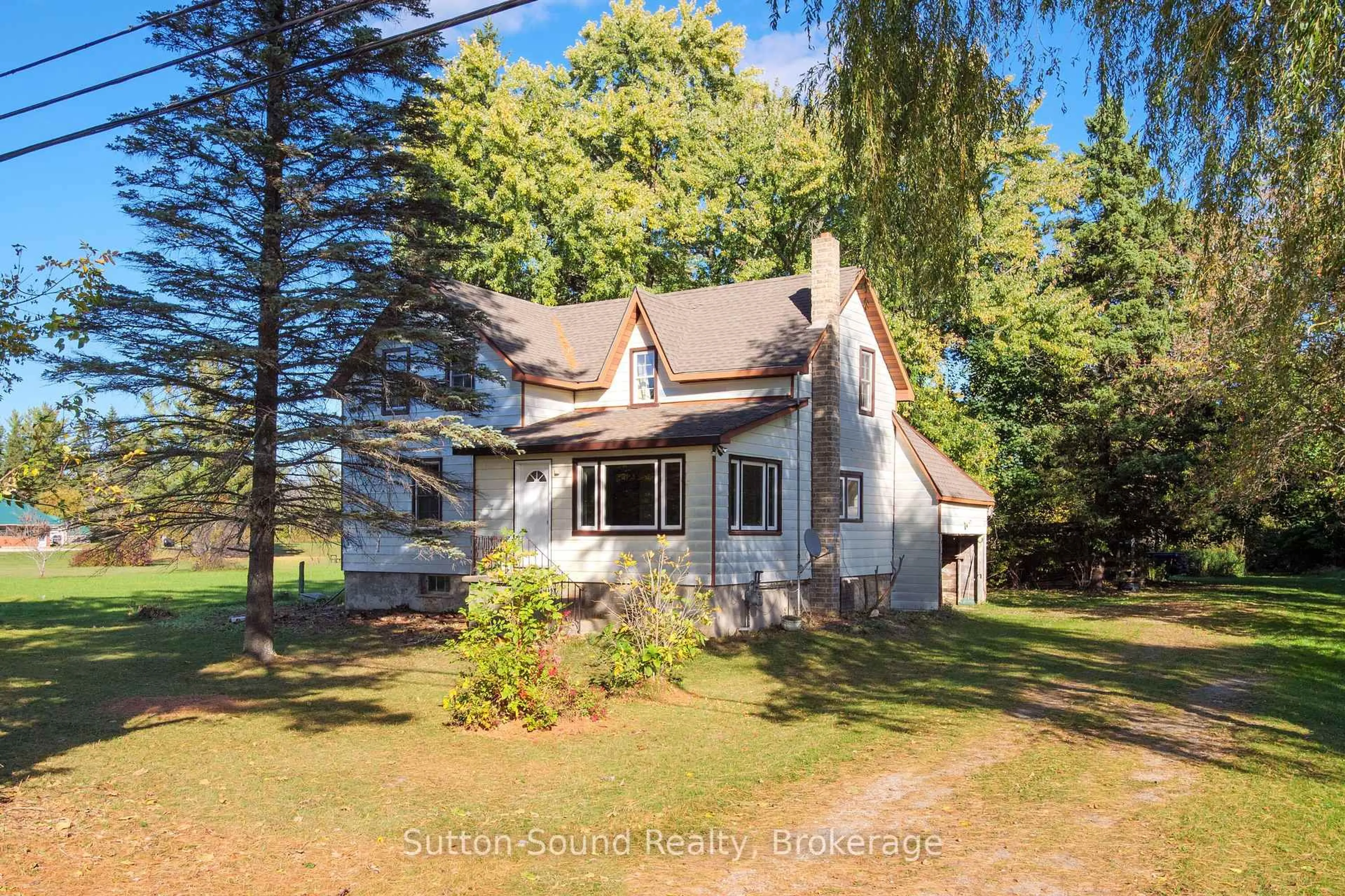 A pic from outside/outdoor area/front of a property/back of a property/a pic from drone, unknown for 19733 Hwy 6 Highway, Georgian Bluffs Ontario N1M 2W3