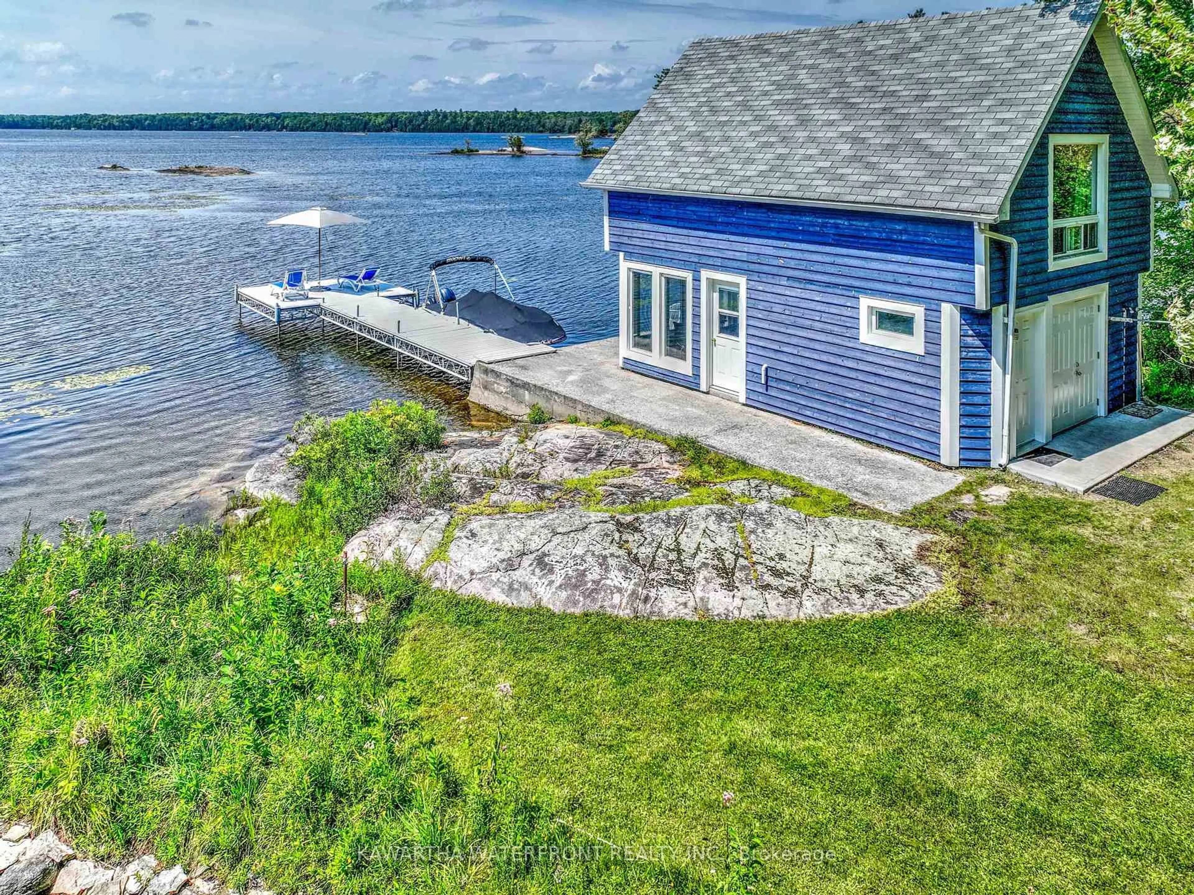 A pic from outside/outdoor area/front of a property/back of a property/a pic from drone, water/lake/river/ocean view for 11 Woodworth Dr, Kawartha Lakes Ontario K0M 1A0