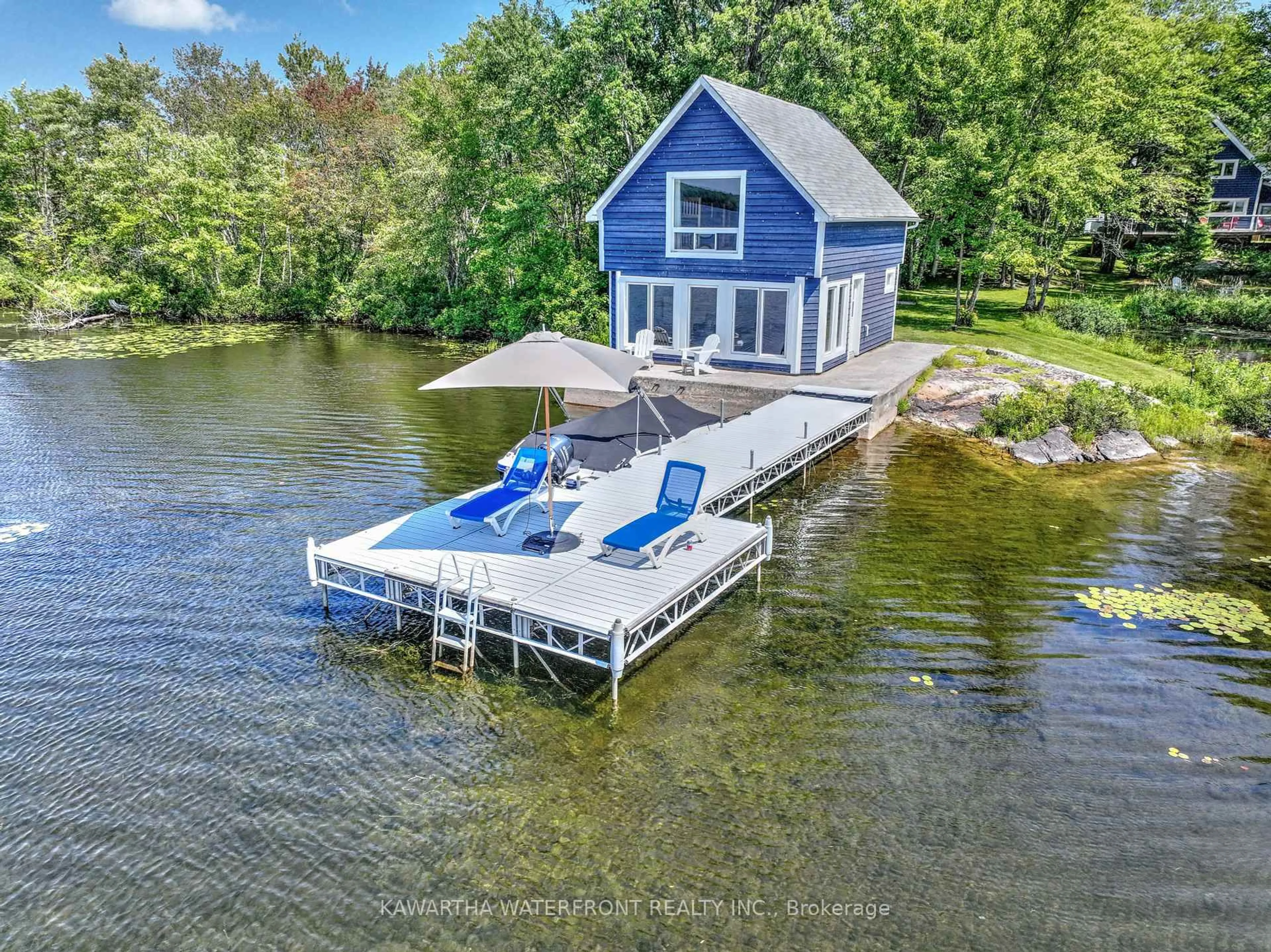 A pic from outside/outdoor area/front of a property/back of a property/a pic from drone, water/lake/river/ocean view for 11 Woodworth Dr, Kawartha Lakes Ontario K0M 1A0