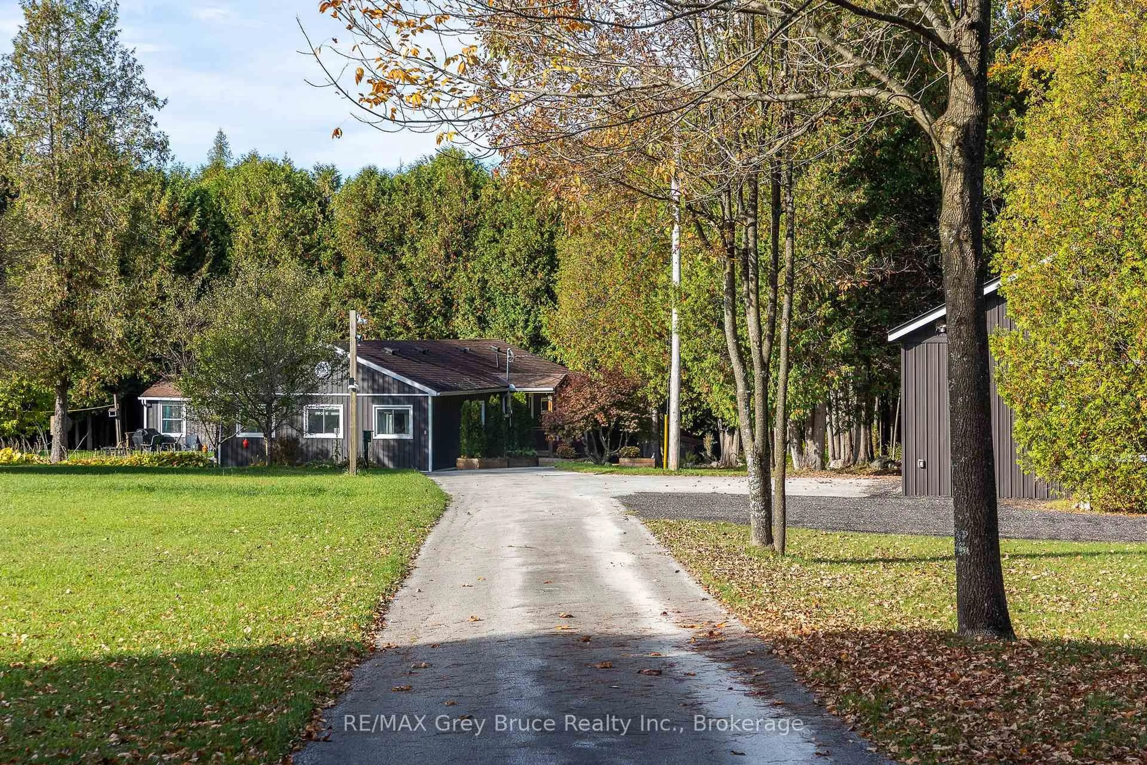 A pic from outside/outdoor area/front of a property/back of a property/a pic from drone, street for 495204 Traverston Rd, West Grey Ontario N0C 1H0