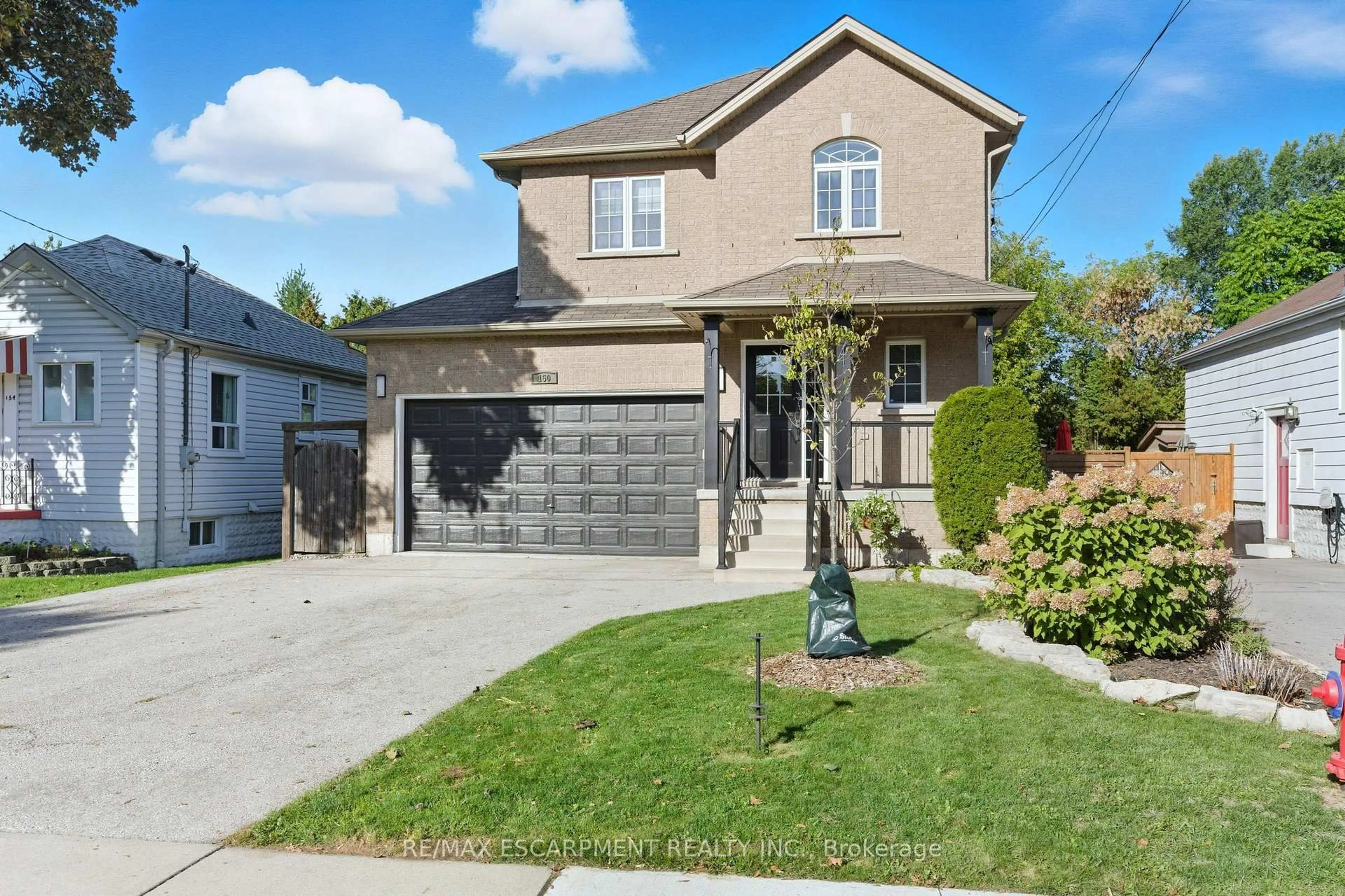 Home with brick exterior material, street for 150 East 38th St, Hamilton Ontario L8V 4E7